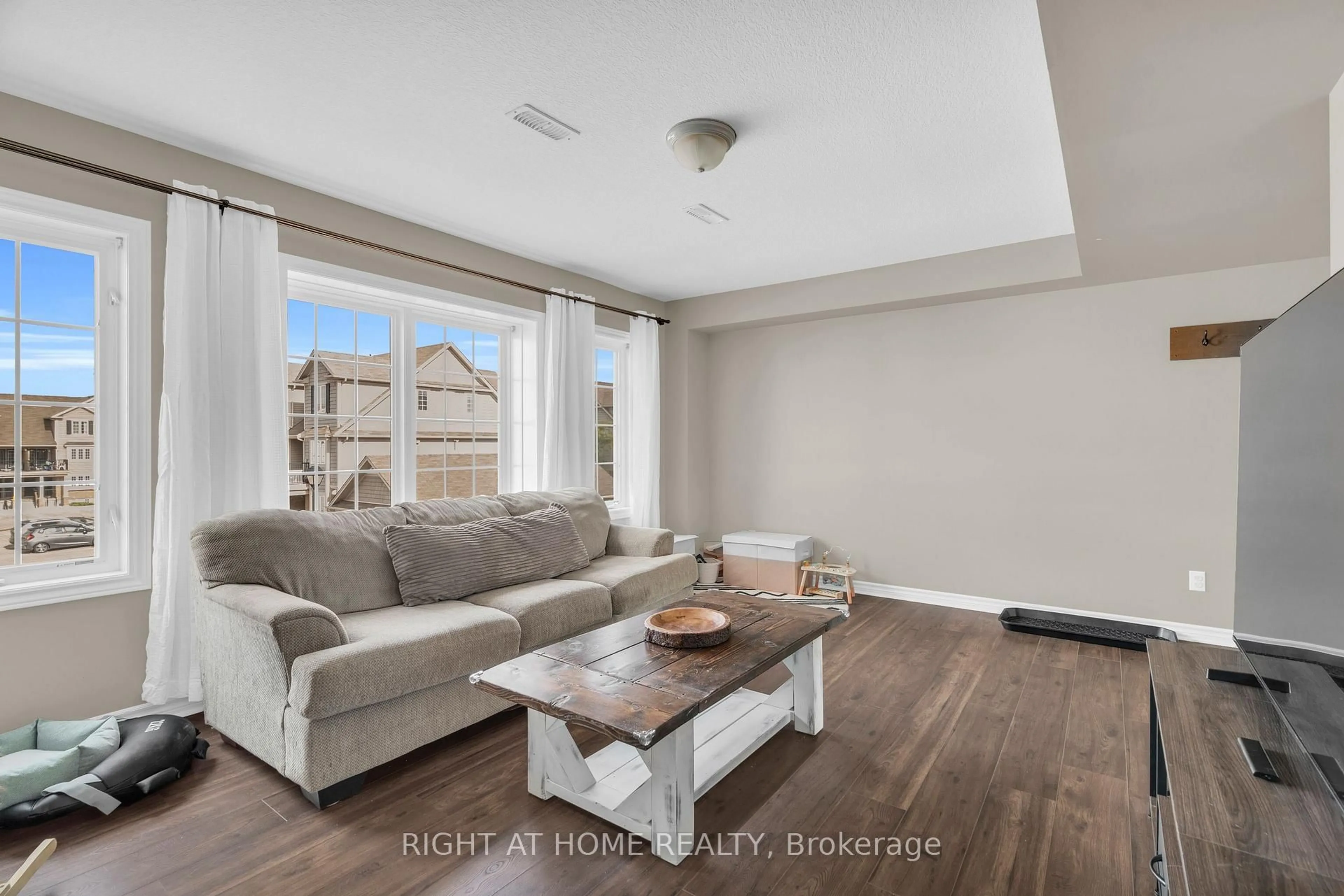 Living room with furniture, unknown for 630 Woodlawn Rd #B, Guelph Ontario N1E 0K4