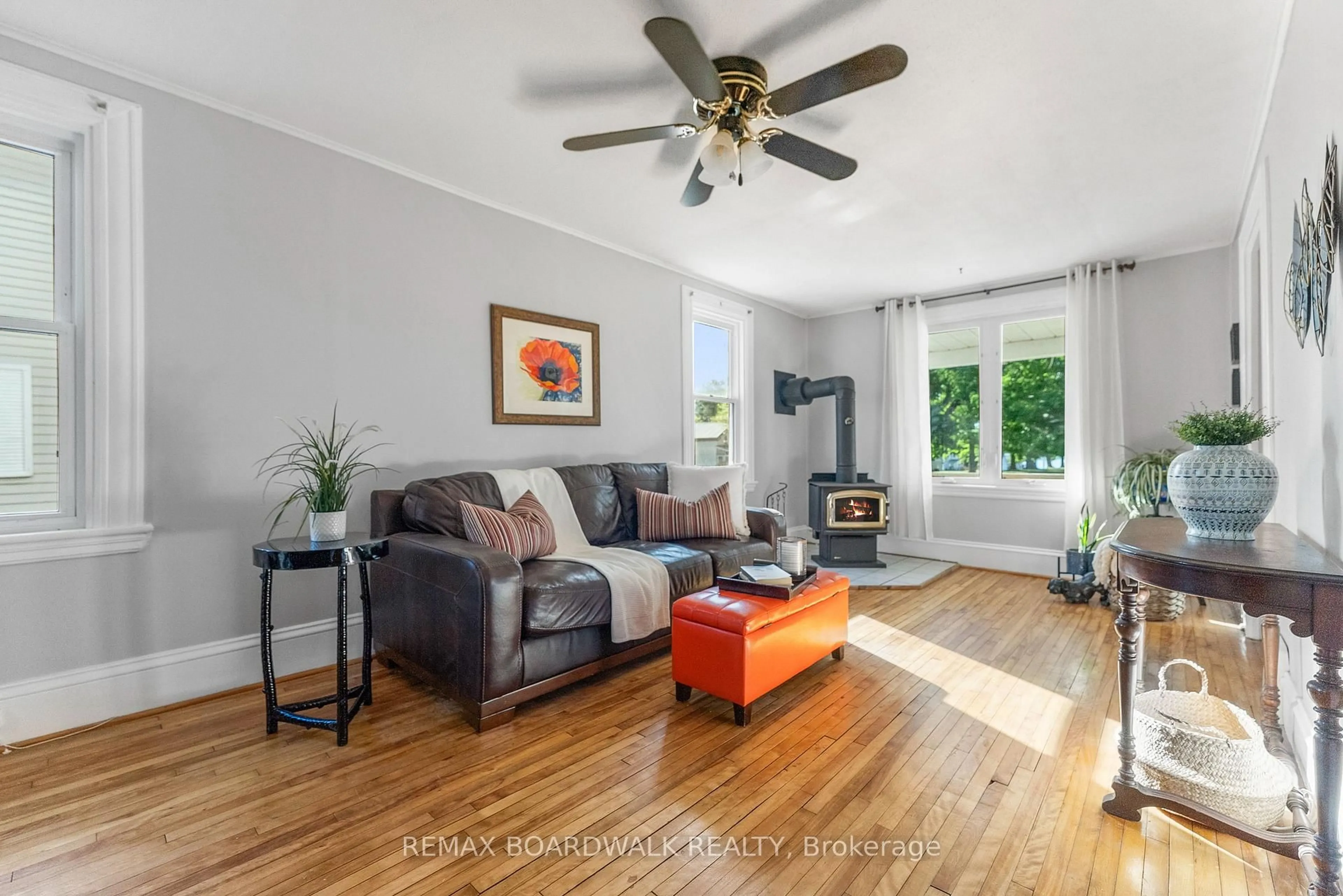 Living room with furniture, wood/laminate floor for 416 Dibble St, Prescott Ontario K0E 1T0