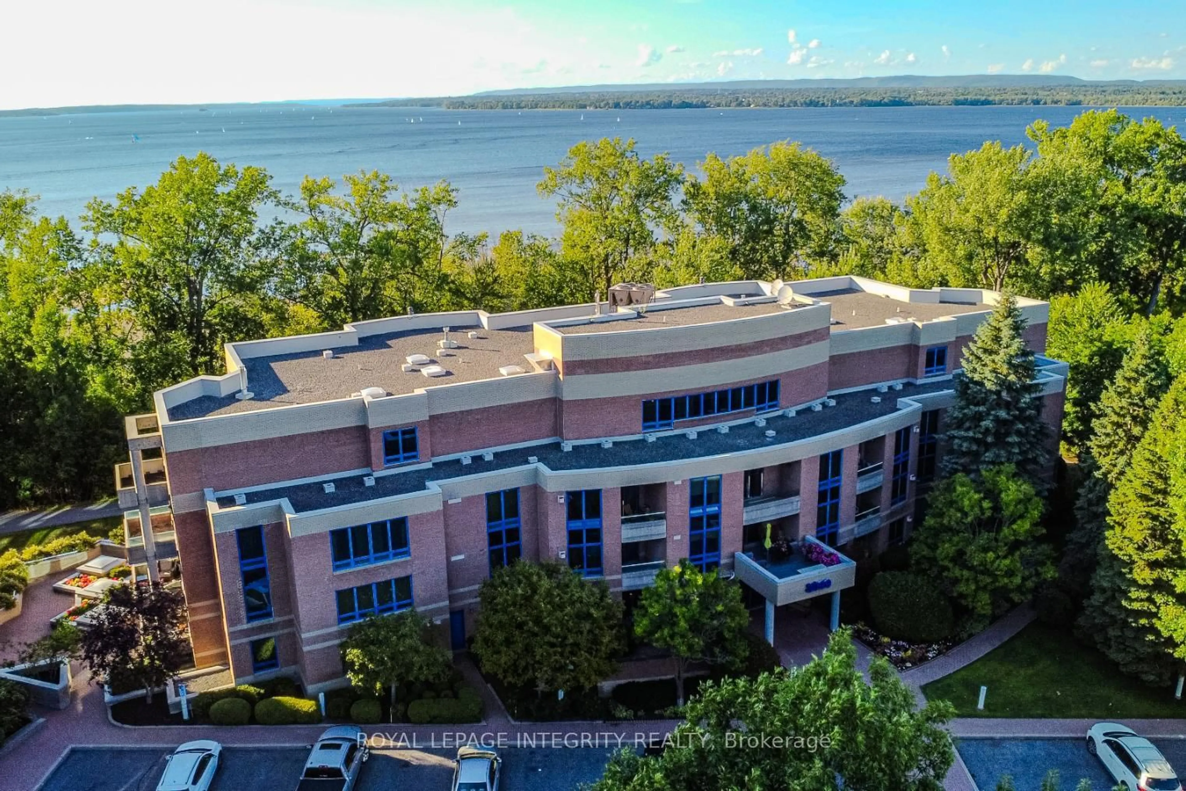 A pic from outside/outdoor area/front of a property/back of a property/a pic from drone, water/lake/river/ocean view for 3099 Carling Ave #203, Ottawa Ontario K2H 5A6