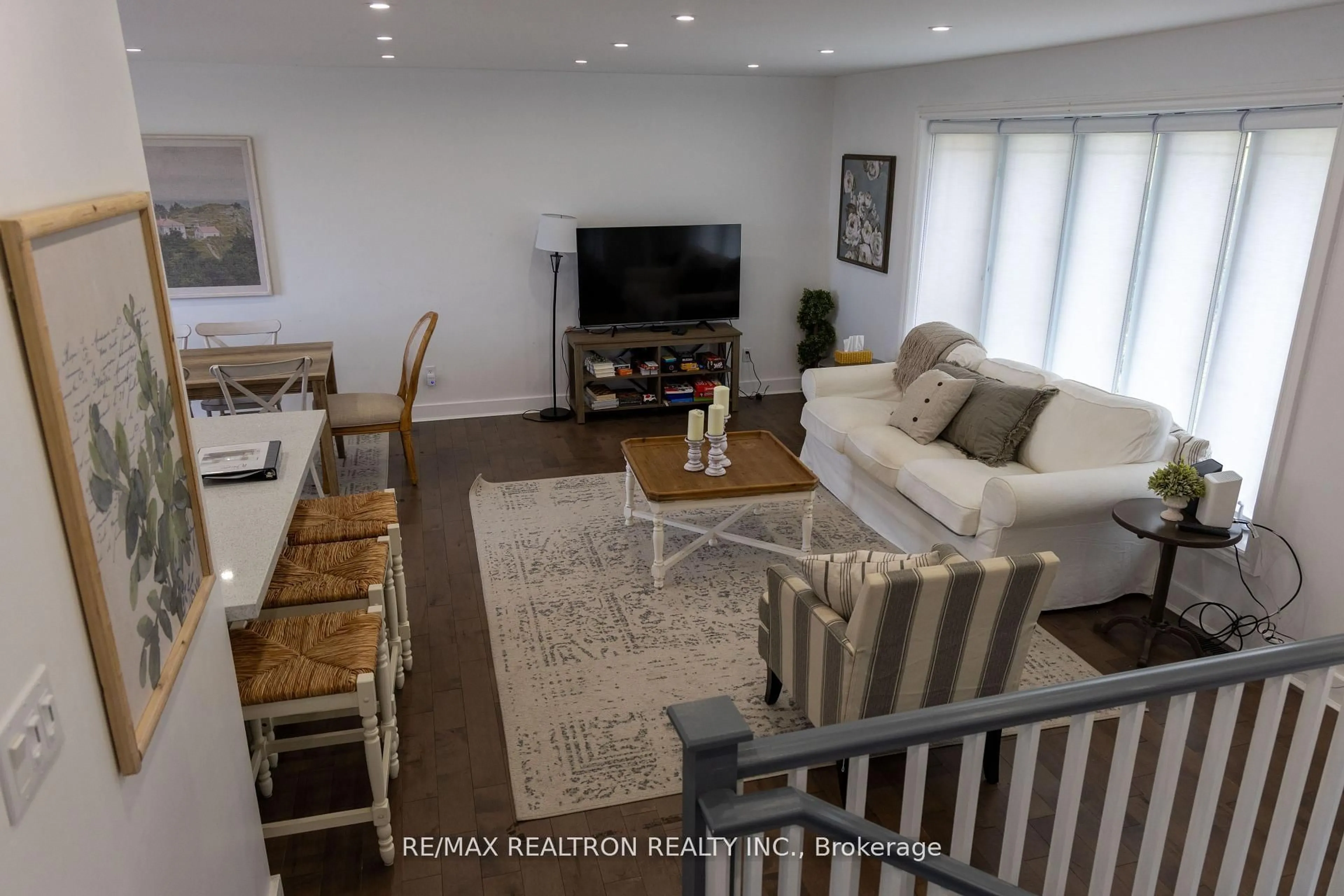 Living room with furniture, wood/laminate floor for 47 Newman Rd, Kawartha Lakes Ontario K0M 2C0