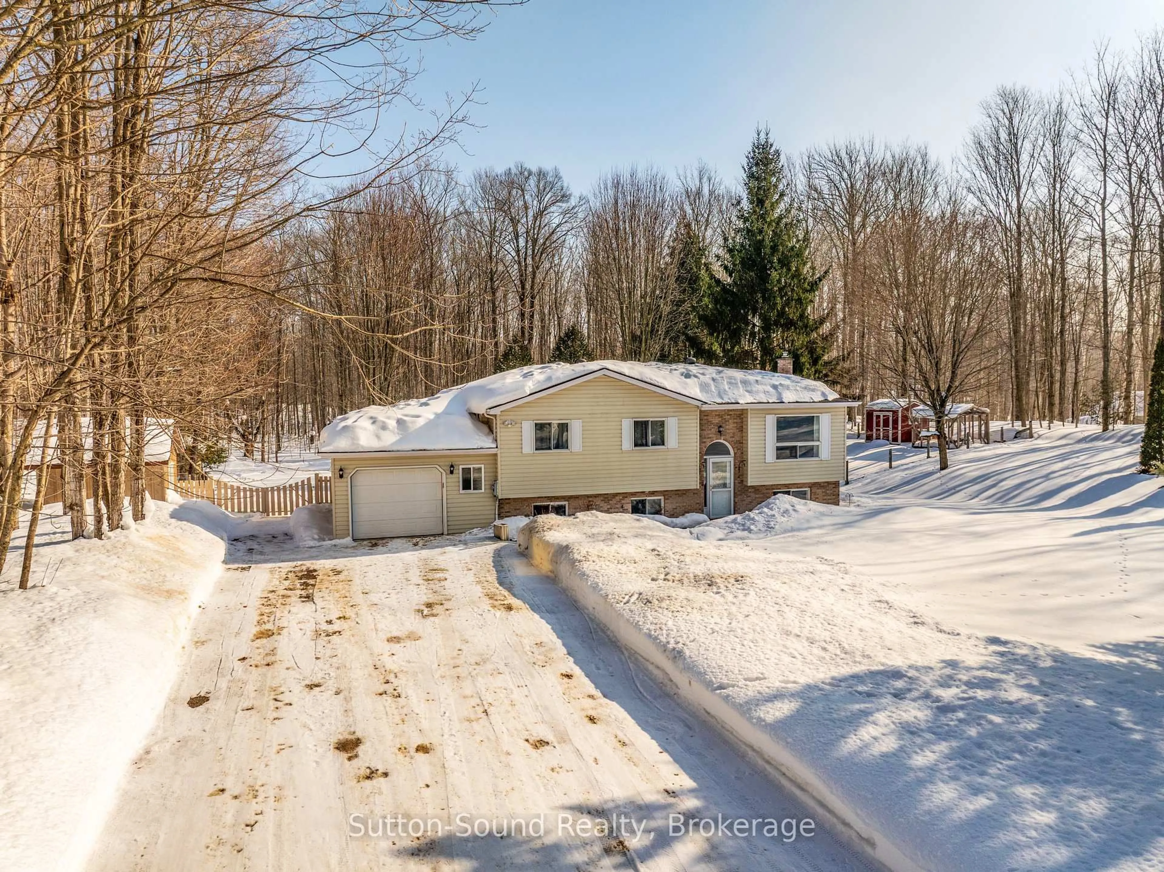 A pic from outside/outdoor area/front of a property/back of a property/a pic from drone, street for 280216 Sideroad 15, Georgian Bluffs Ontario N0H 2K0