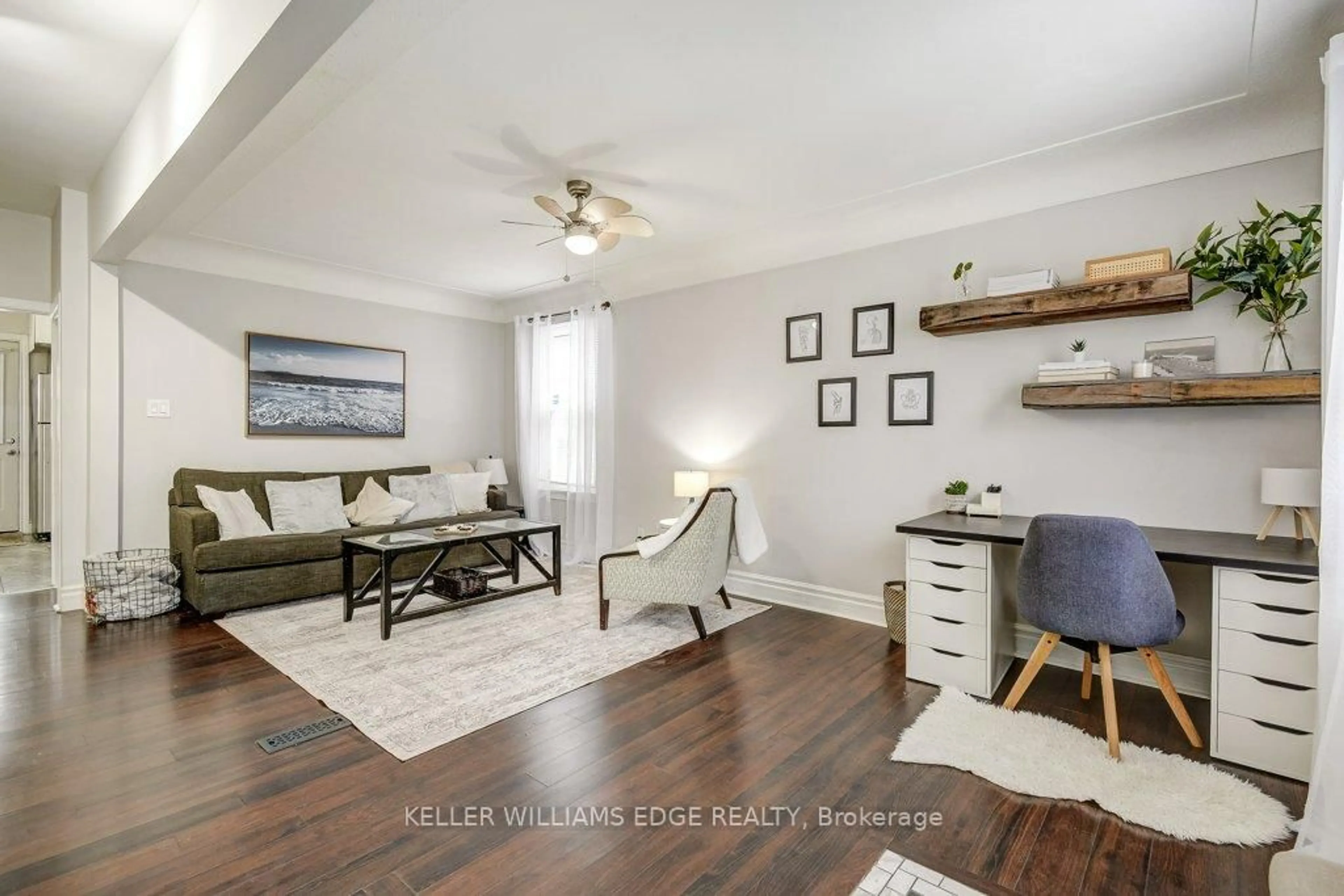 Living room with furniture, wood/laminate floor for 14 Baker St, Hamilton Ontario L8R 1V3