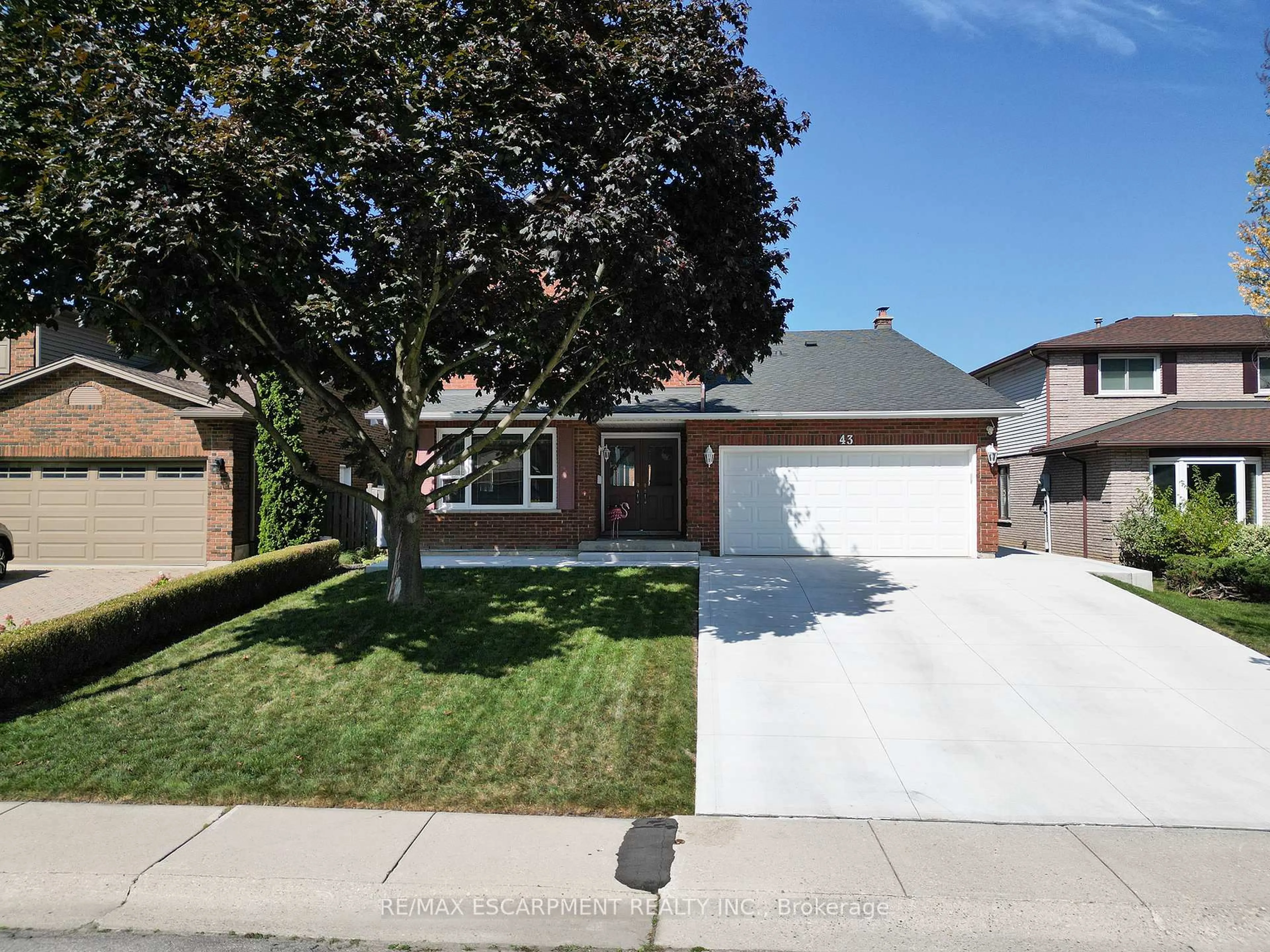 Home with brick exterior material, street for 43 Flamingo Dr, Hamilton Ontario L9A 4X6