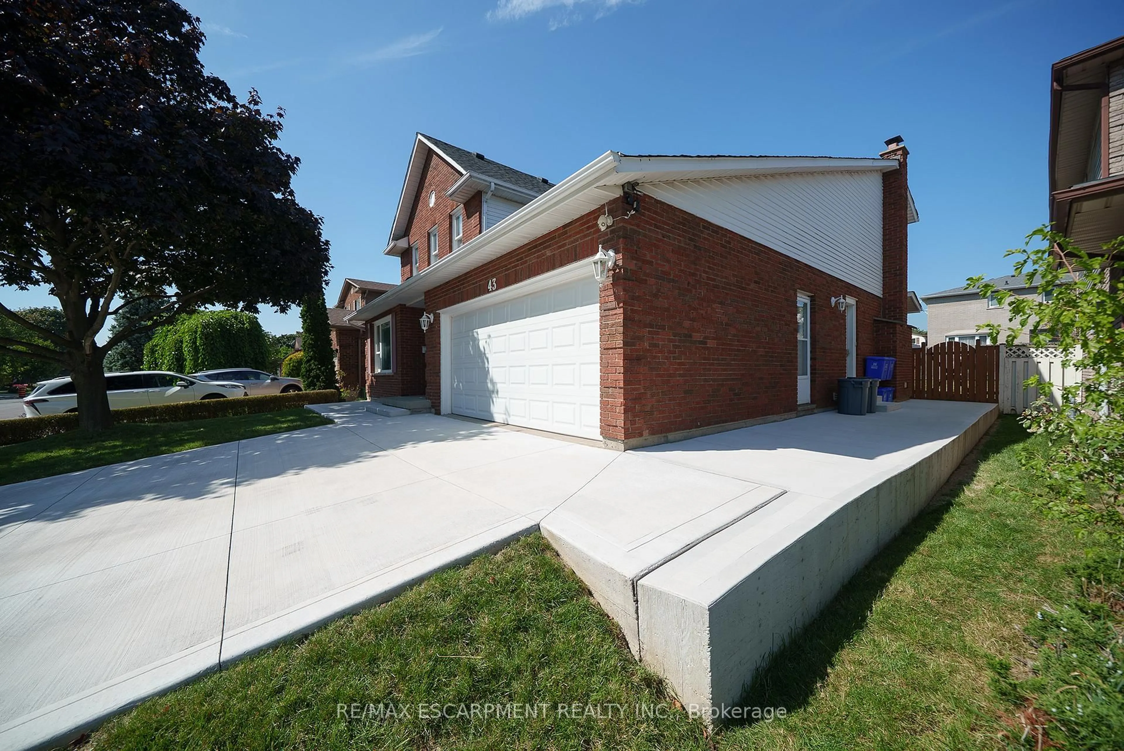 Home with brick exterior material, street for 43 Flamingo Dr, Hamilton Ontario L9A 4X6