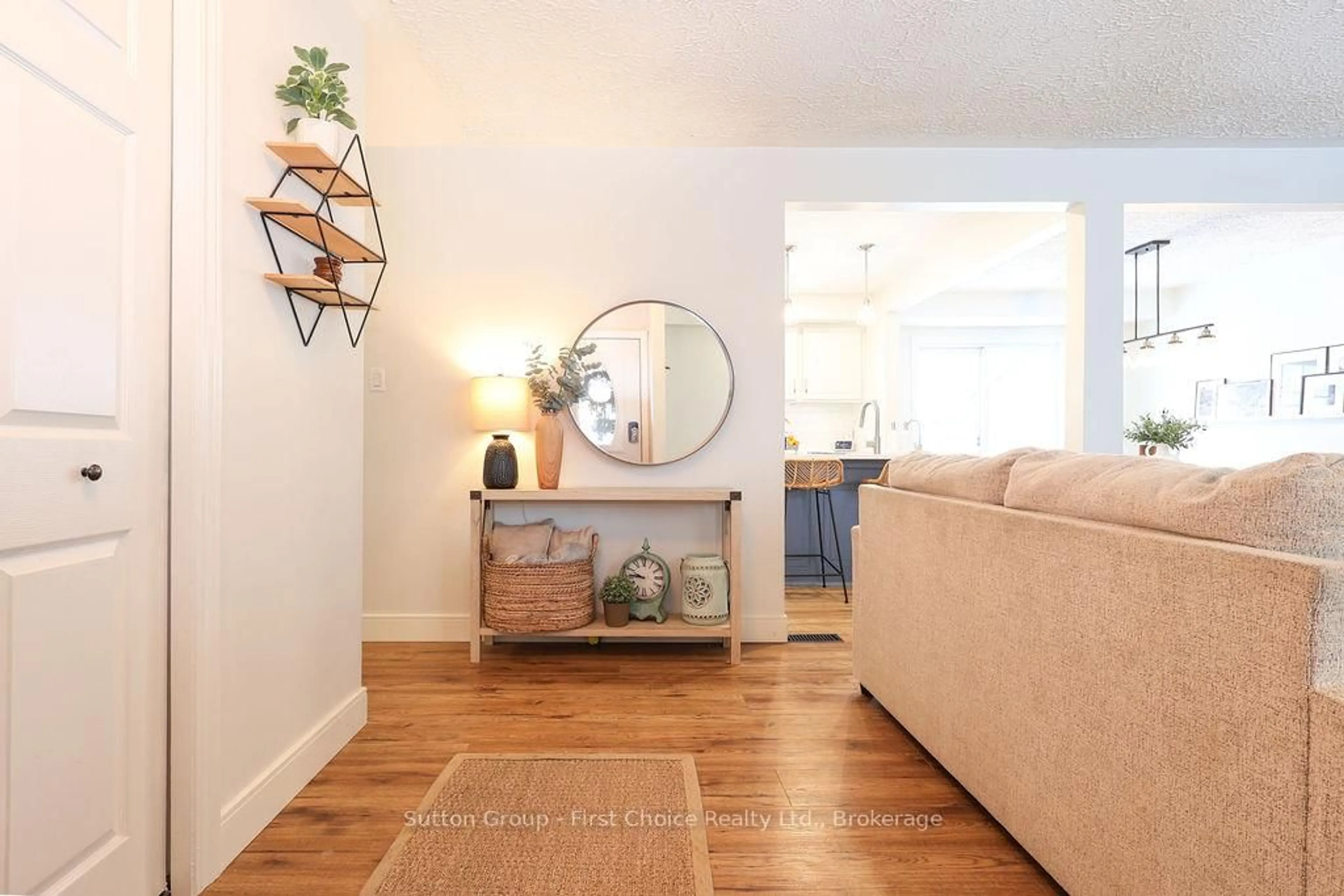 Living room with furniture, wood/laminate floor for 151 Bedford Dr, Stratford Ontario N5A 5J7