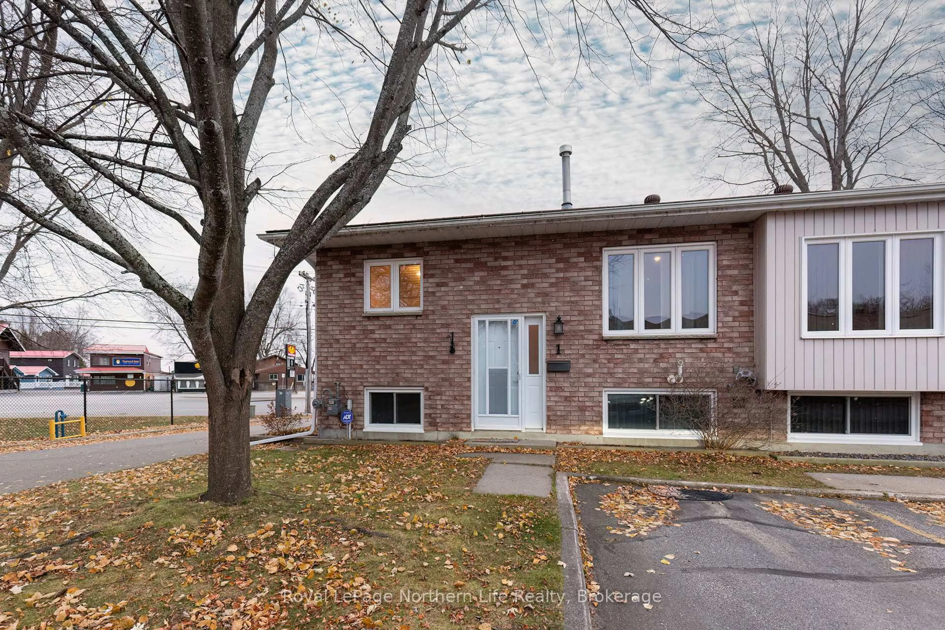 Home with brick exterior material, street for 624 Lakeshore Dr #1, North Bay Ontario P1A 2E8