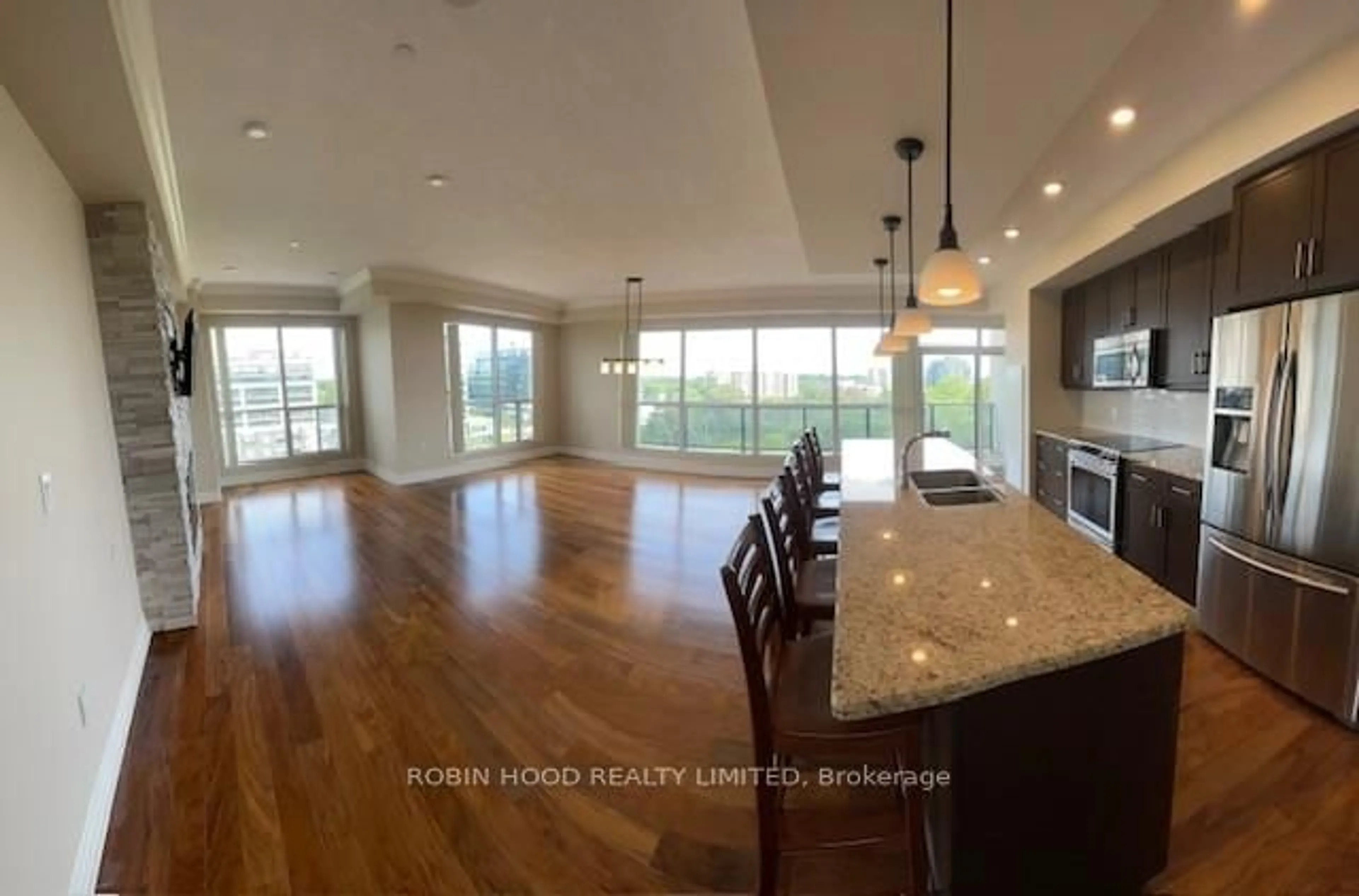 Open concept kitchen, wood/laminate floor for 150 Wellington St #Unit 612, Guelph Ontario N1H 0B5