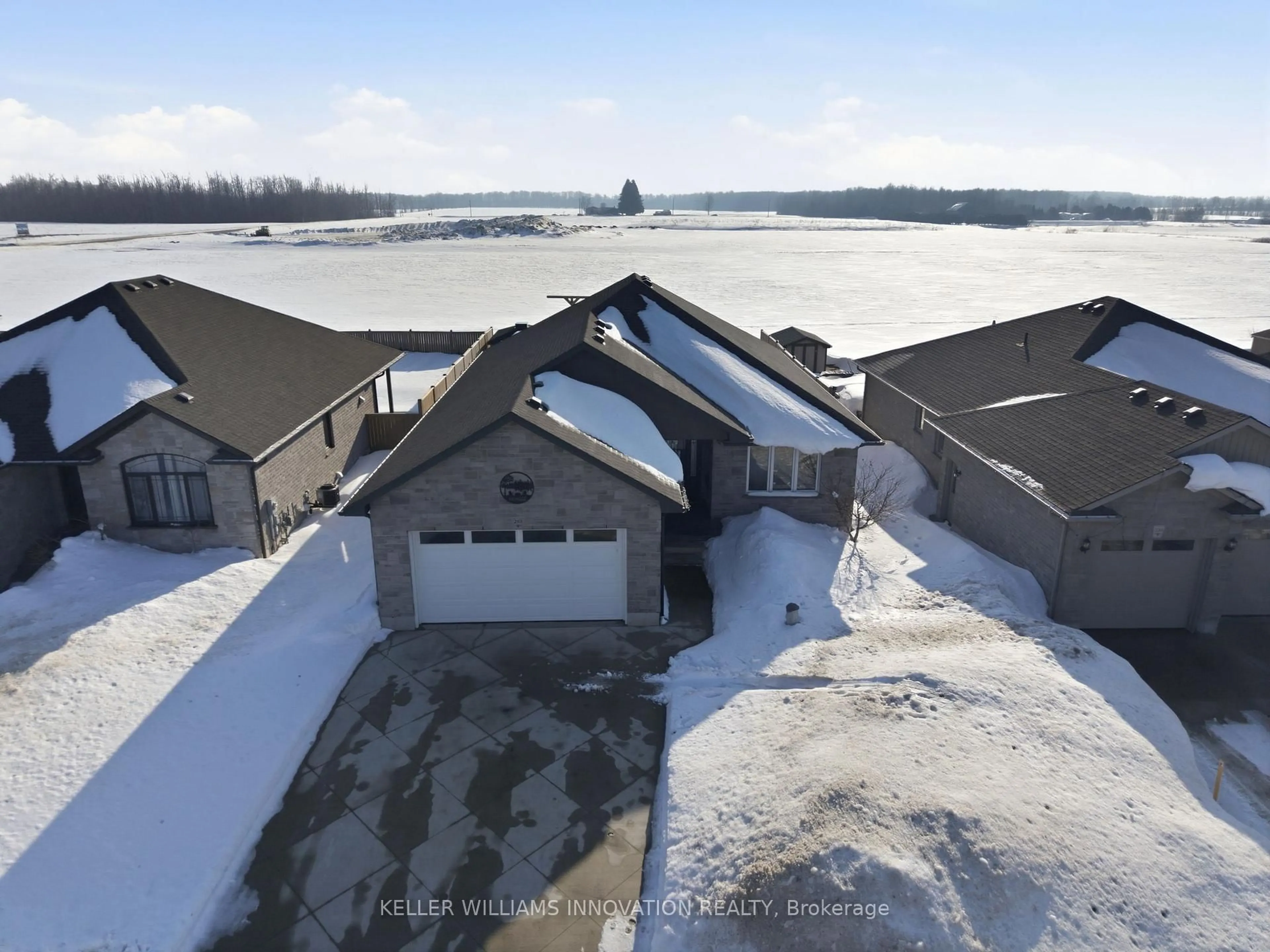 A pic from outside/outdoor area/front of a property/back of a property/a pic from drone, water/lake/river/ocean view for 210 Krotz St, North Perth Ontario N4W 0E1