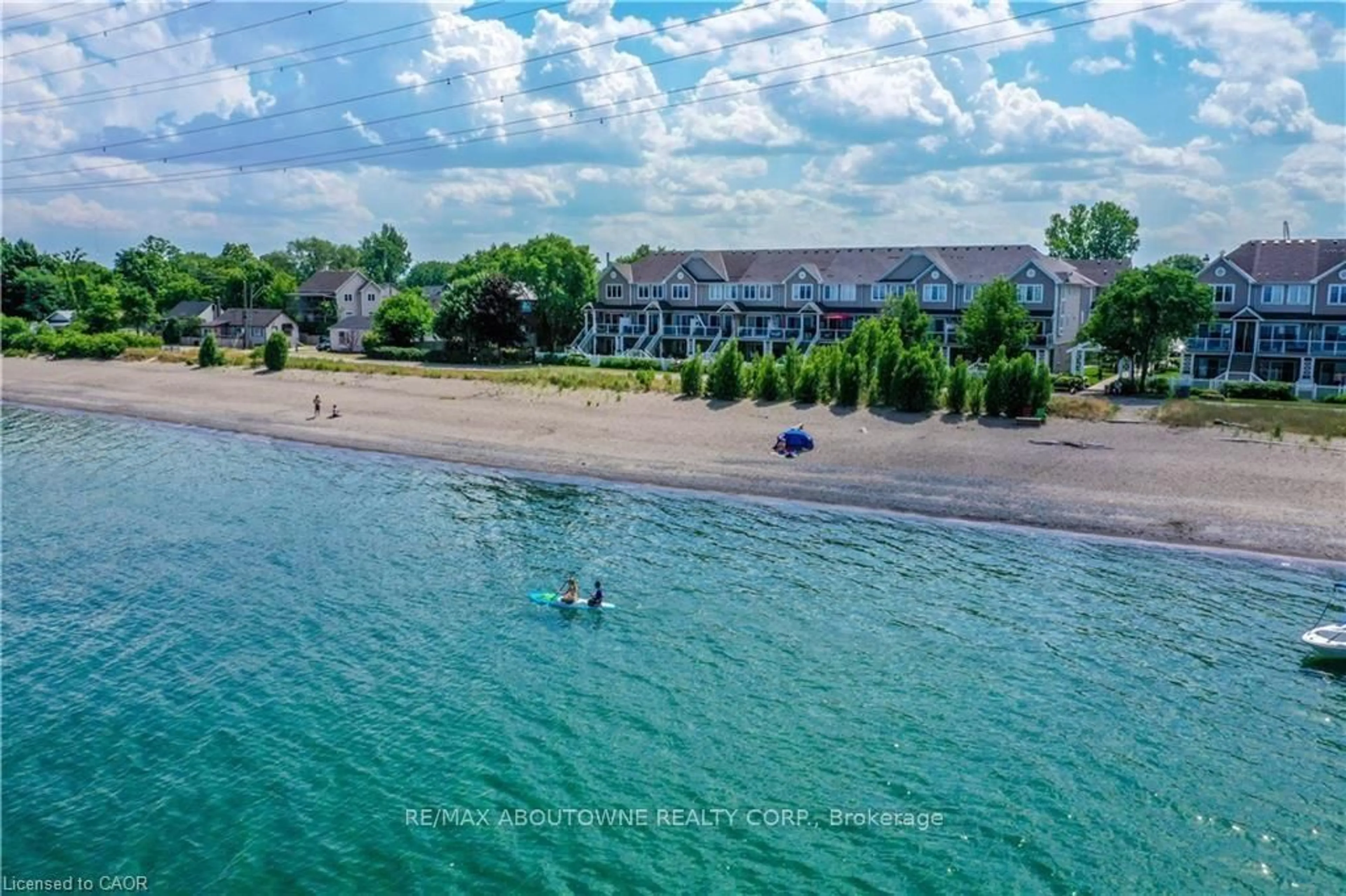 A pic from outside/outdoor area/front of a property/back of a property/a pic from drone, water/lake/river/ocean view for 337 Beach Blvd ##3, Hamilton Ontario L8H 6W4