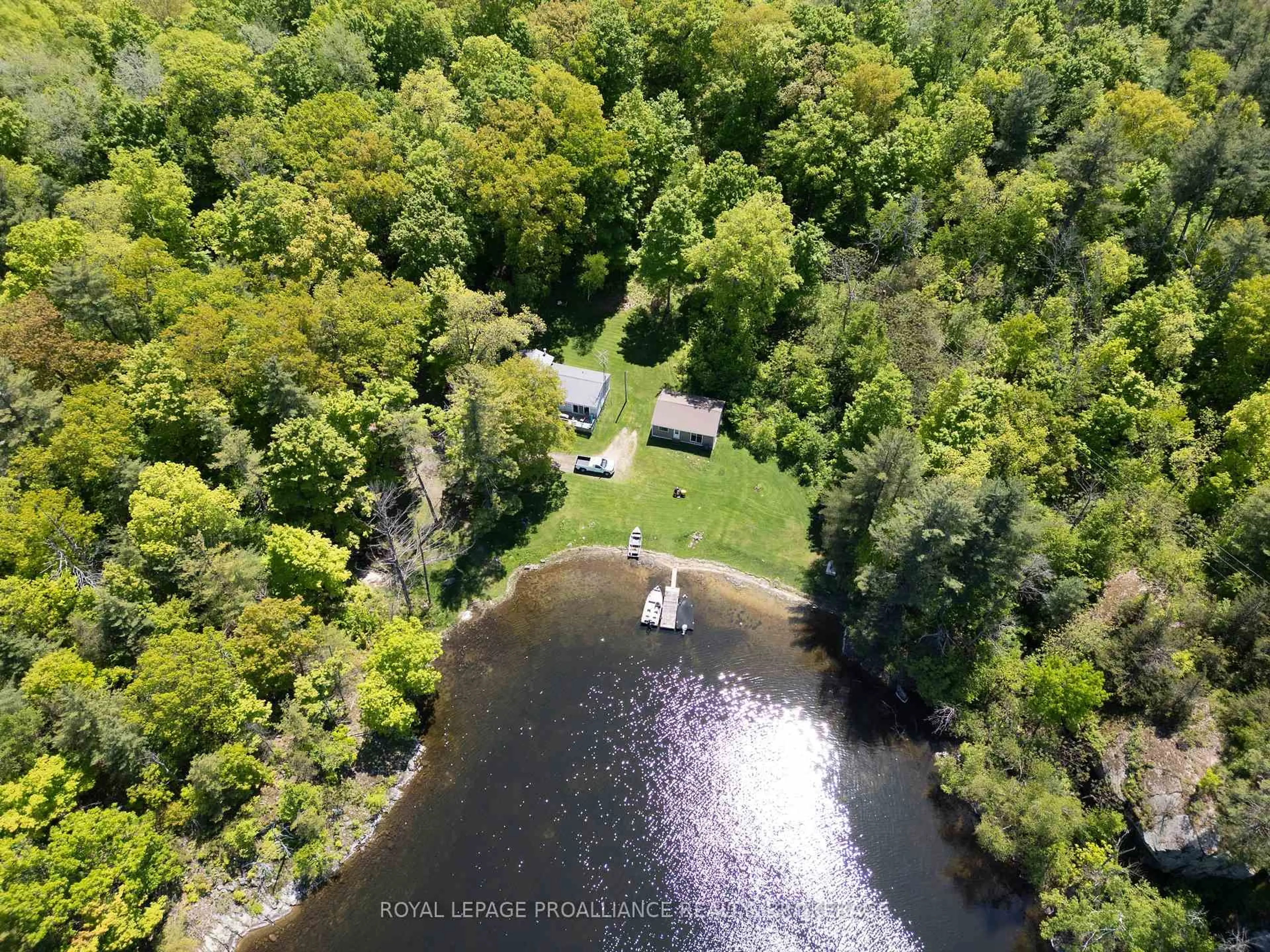 A pic from outside/outdoor area/front of a property/back of a property/a pic from drone, water/lake/river/ocean view for 1122 Gananoque Lake Rd, Front of Leeds & Seeleys Bay Ontario K7G 2V4