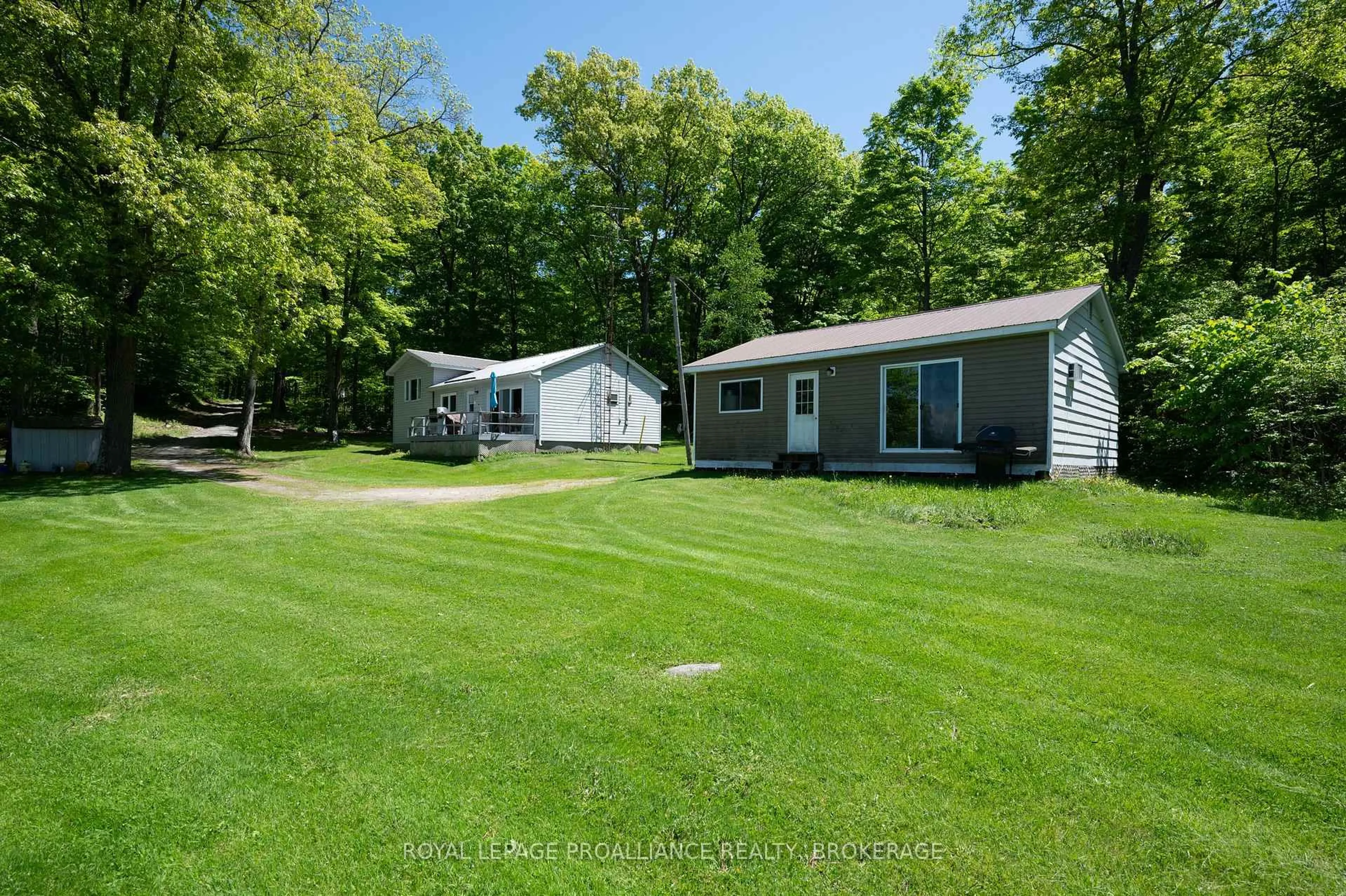 A pic from outside/outdoor area/front of a property/back of a property/a pic from drone, water/lake/river/ocean view for 1122 Gananoque Lake Rd, Front of Leeds & Seeleys Bay Ontario K7G 2V4