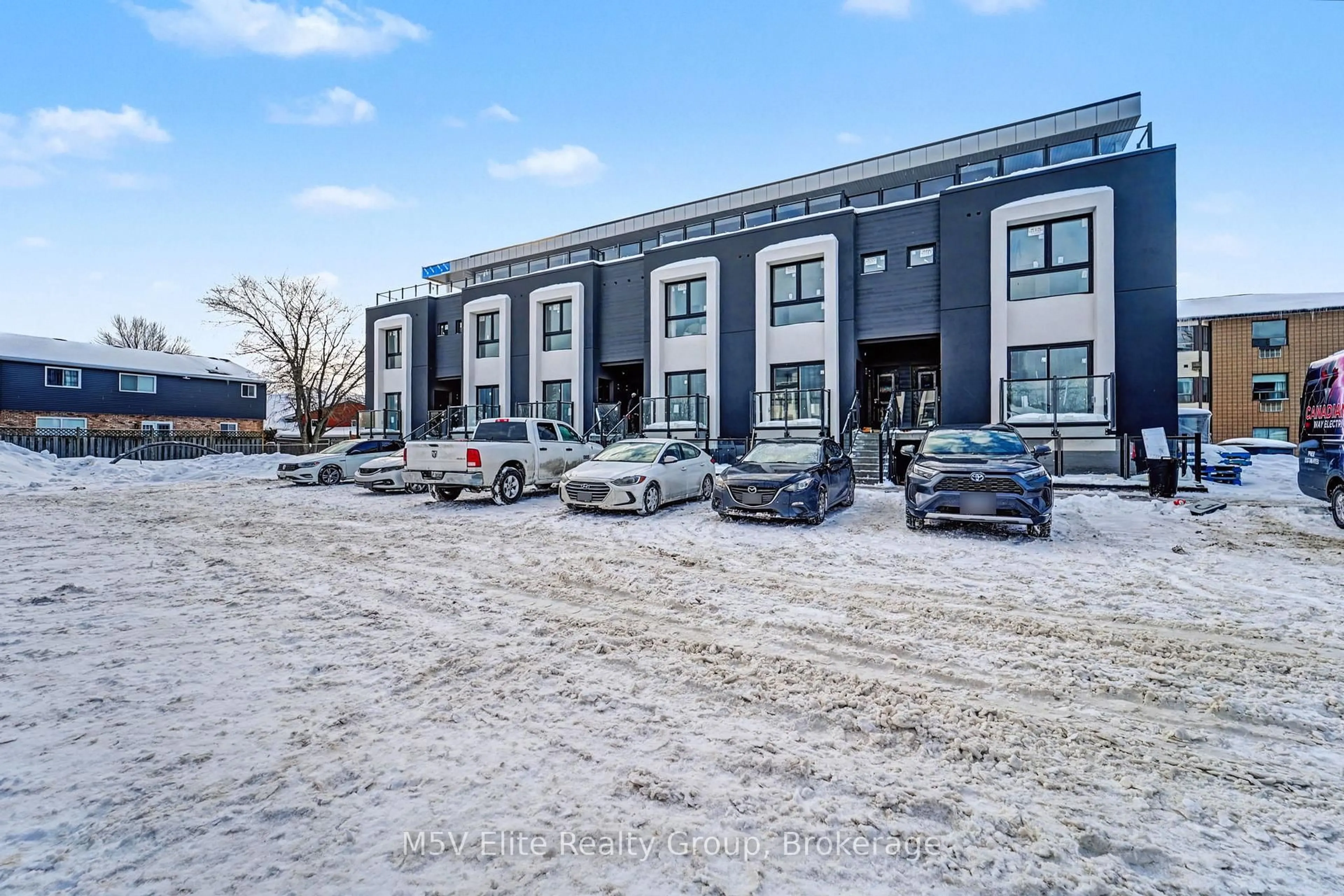 A pic from outside/outdoor area/front of a property/back of a property/a pic from drone, unknown for 6638 McLeod Rd Rd #318, Niagara Falls Ontario L2G 3G5