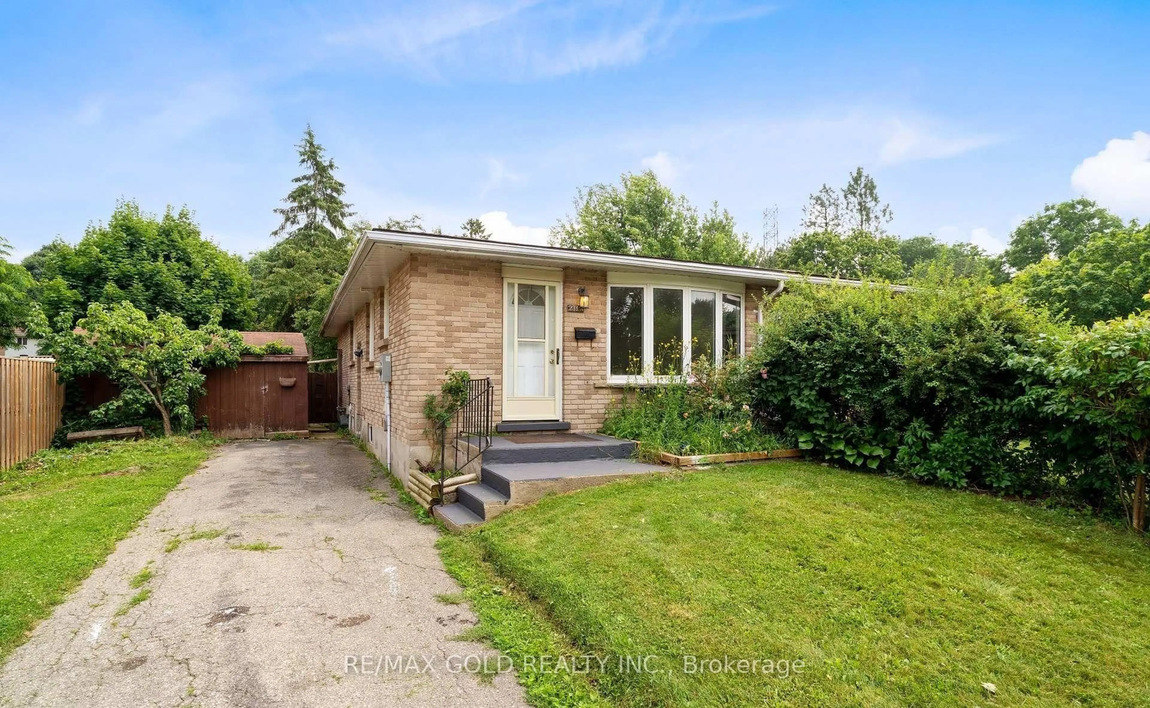 Home with brick exterior material, street for 231A Cedarbrae Ave, Waterloo Ontario N2L 4S6