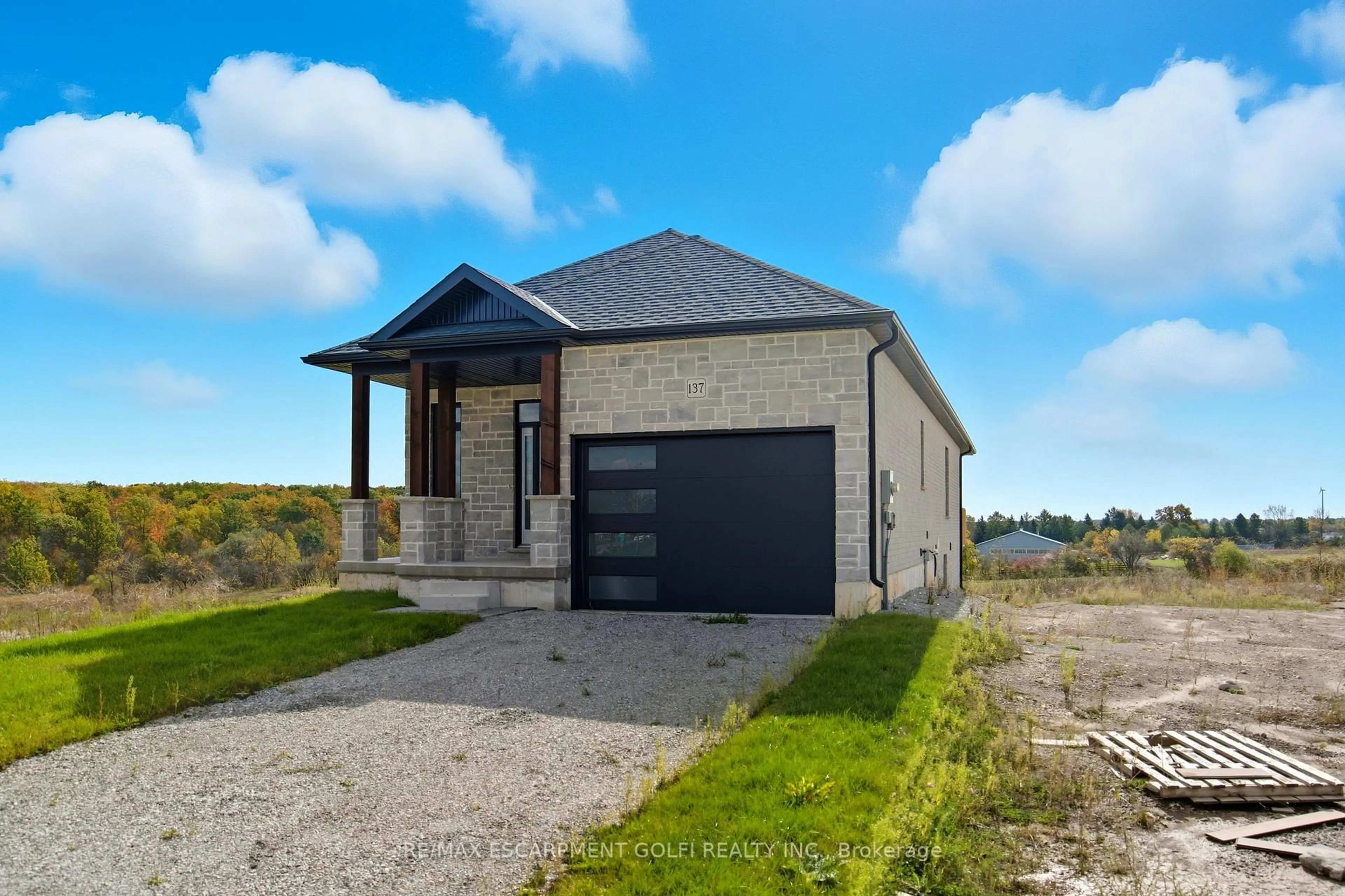 Home with brick exterior material, unknown for 137 Pike Creek Dr, Haldimand Ontario N0E 1E0