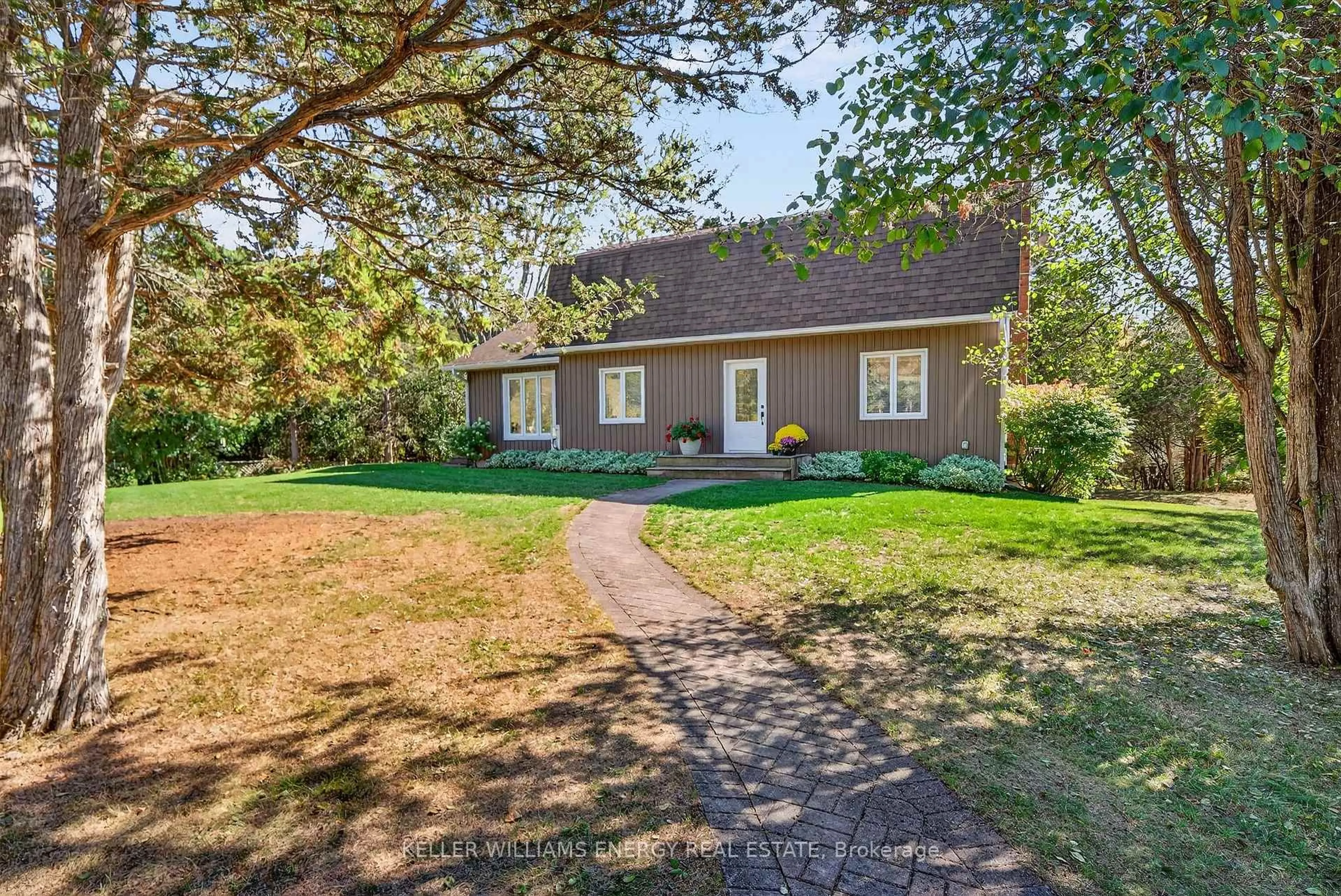 A pic from outside/outdoor area/front of a property/back of a property/a pic from drone, street for 108 Dutch Rd, Prince Edward County Ontario K0K 1T0