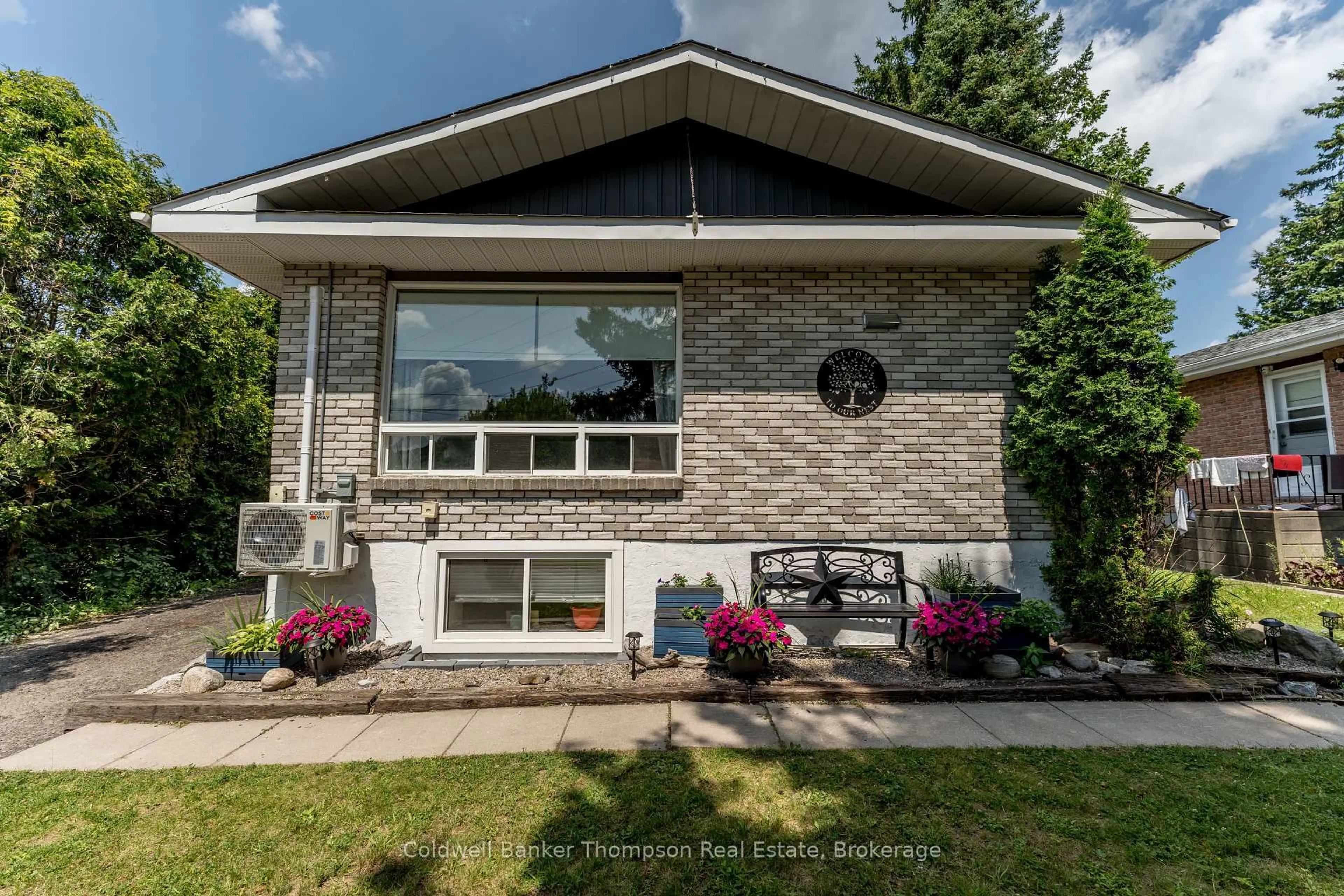 Home with brick exterior material, street for 38 Susan St, Huntsville Ontario P1H 1X2