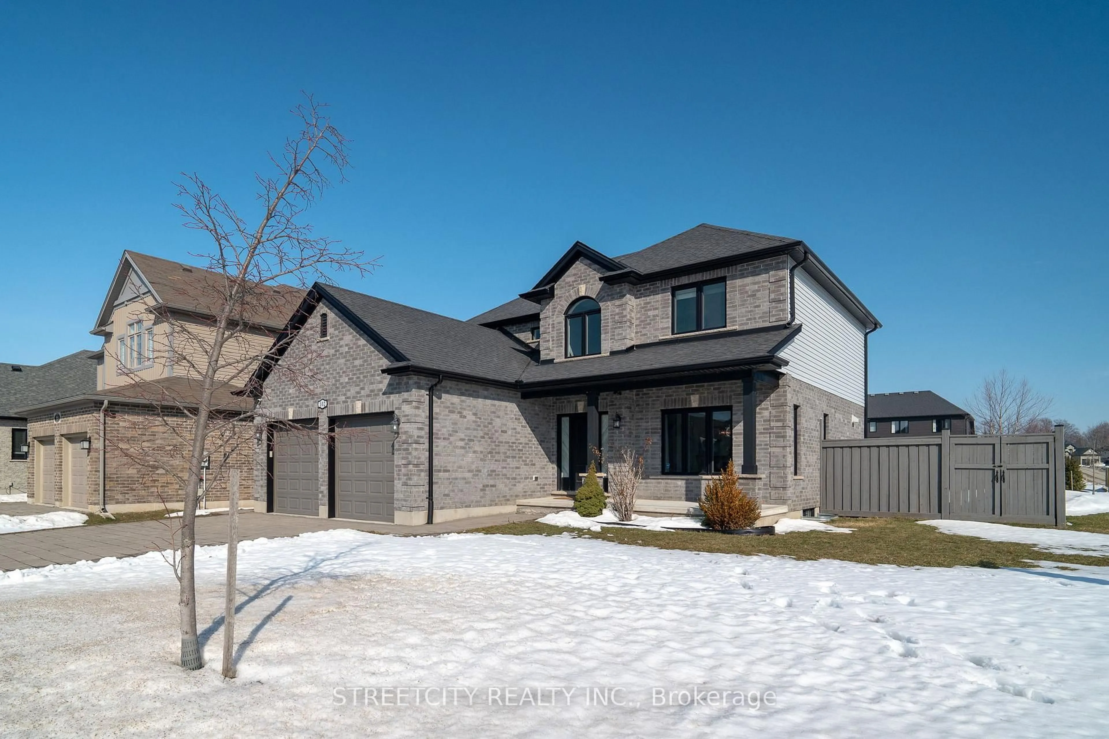 Home with brick exterior material, street for 102 Timberwalk Tr, Middlesex Centre Ontario N0M 2A0