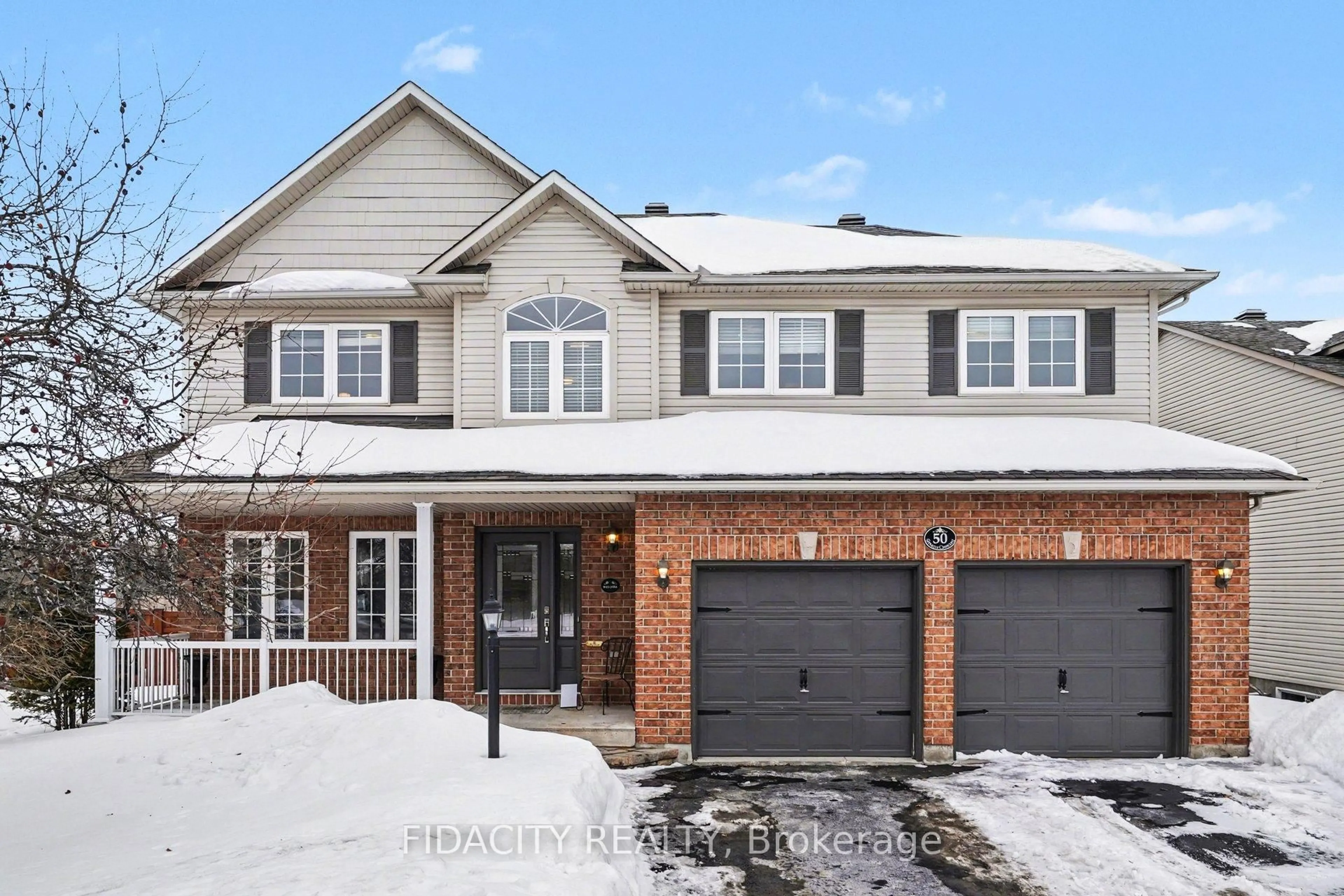 Home with brick exterior material, street for 50 Sirocco Cres, Ottawa Ontario K2S 2C8