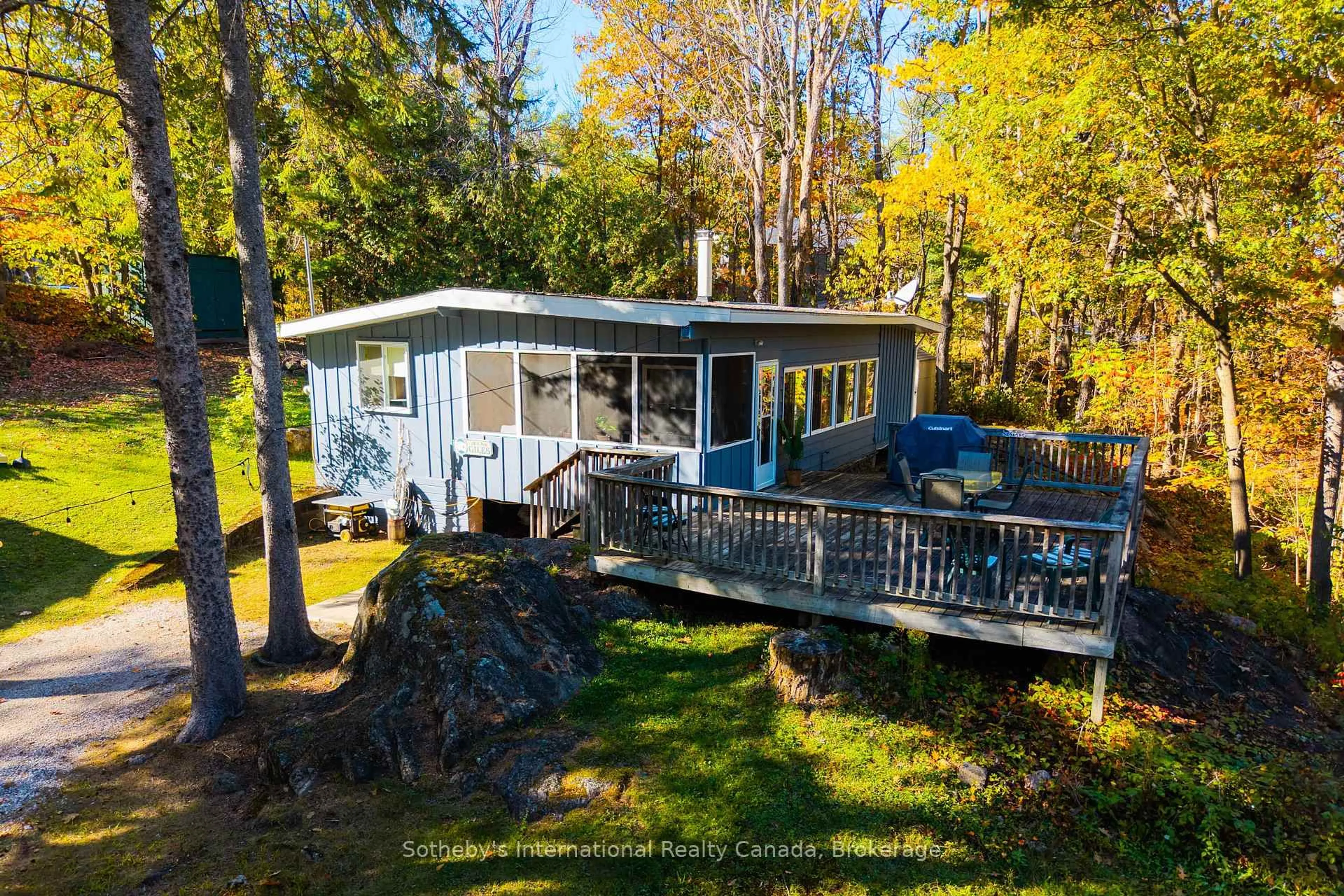 A pic from outside/outdoor area/front of a property/back of a property/a pic from drone, water/lake/river/ocean view for 1161 North Kahshe Lake Rd, Gravenhurst Ontario P0E 1G0
