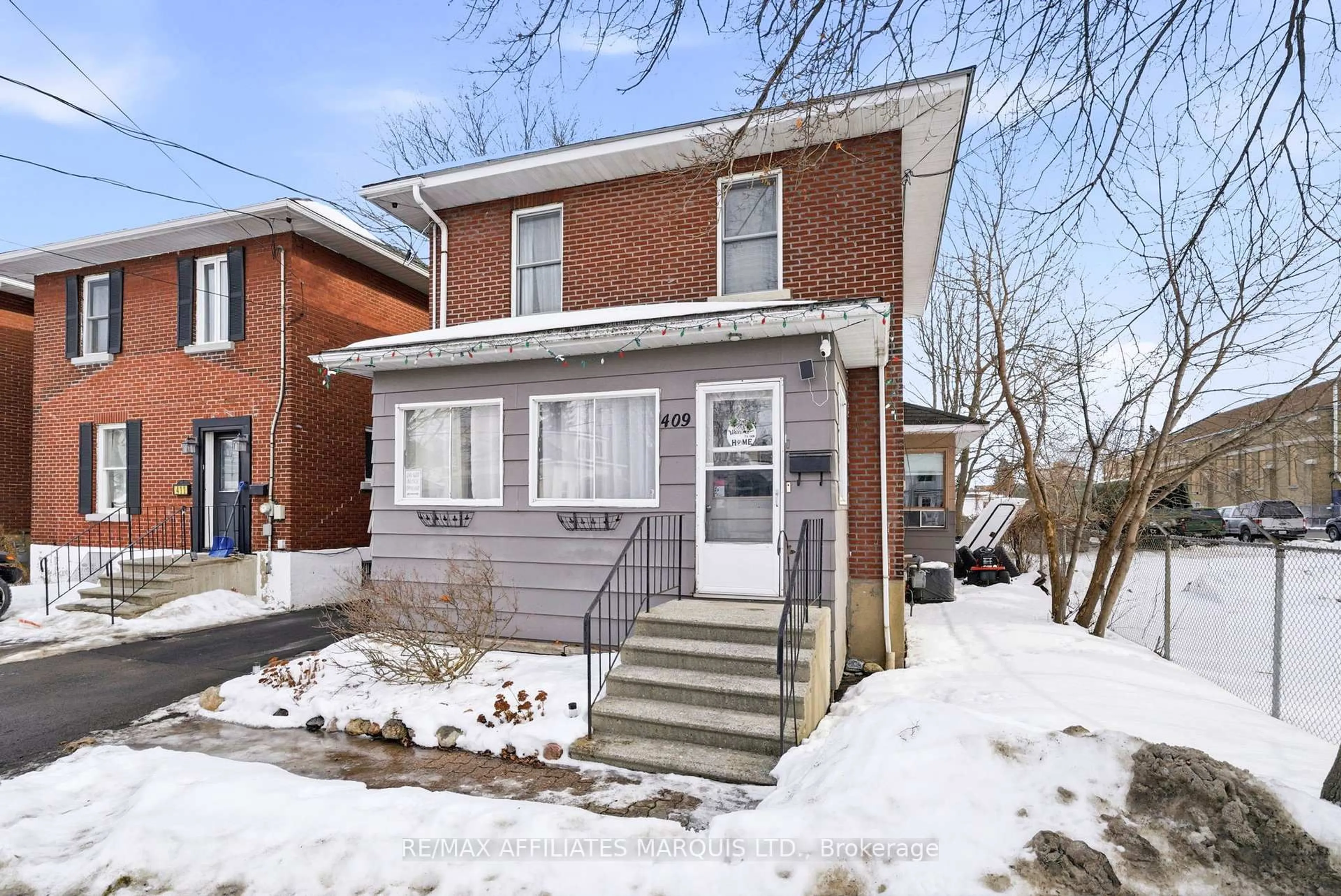 Home with brick exterior material, street for 409 Marlborough St, Cornwall Ontario K6H 4A5