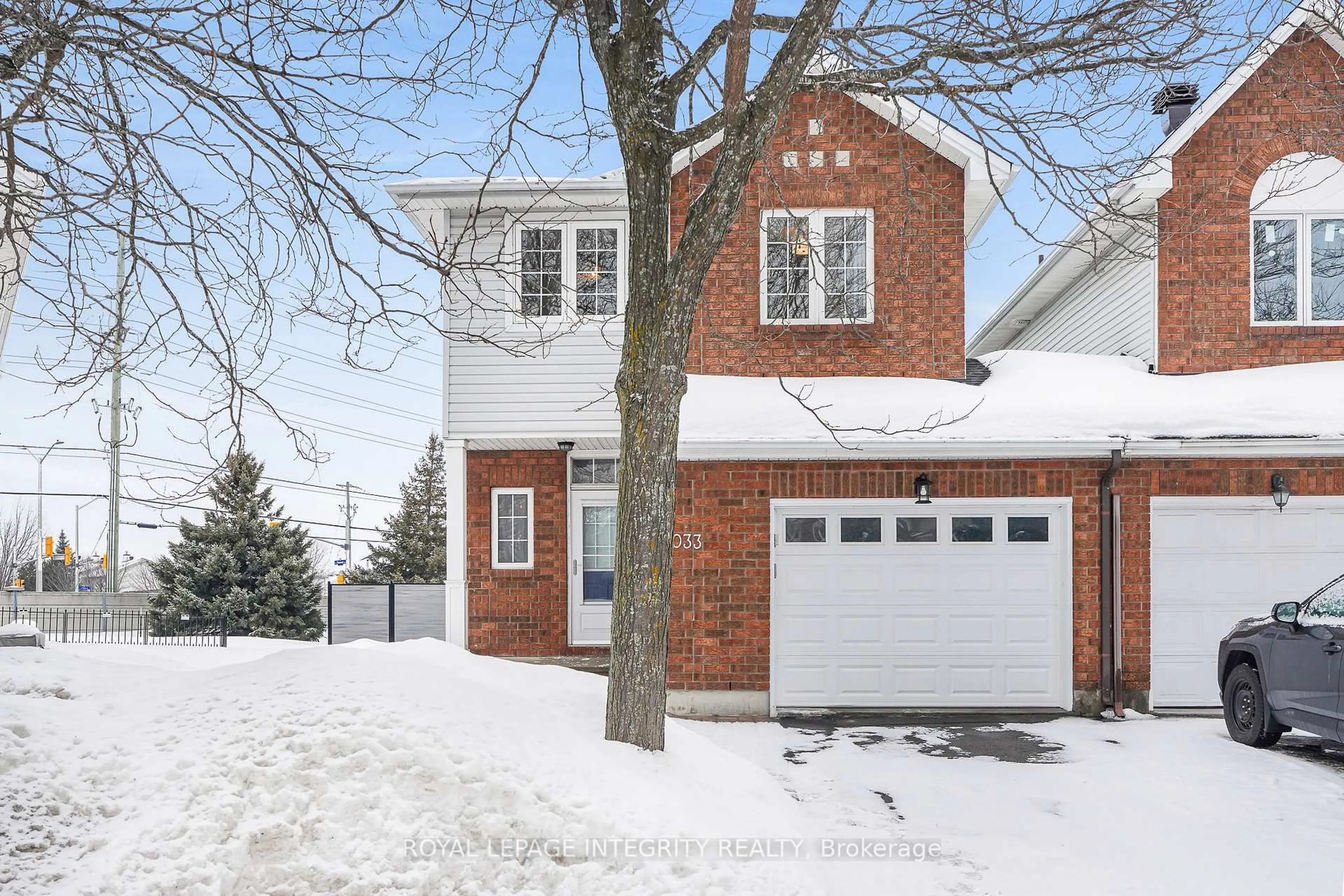 Home with brick exterior material, street for 1033 Markwick Cres, Ottawa Ontario K4A 4X5