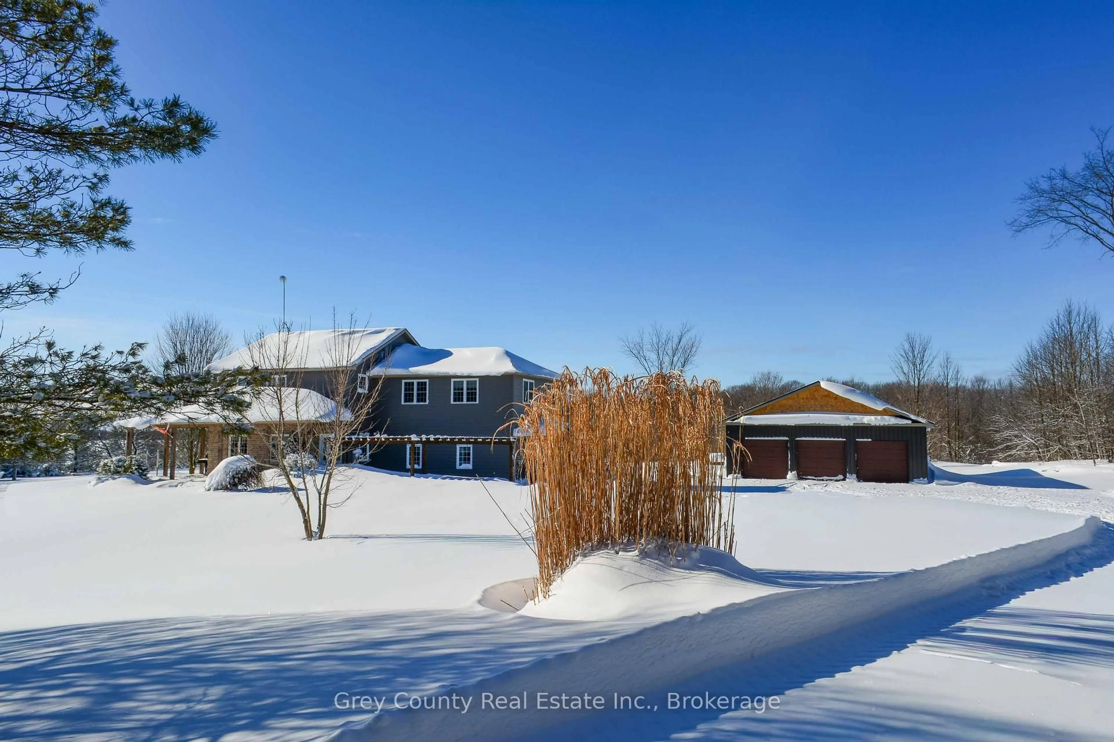 A pic from outside/outdoor area/front of a property/back of a property/a pic from drone, street for 135260 9th Line, Grey Highlands Ontario N0C 1H0
