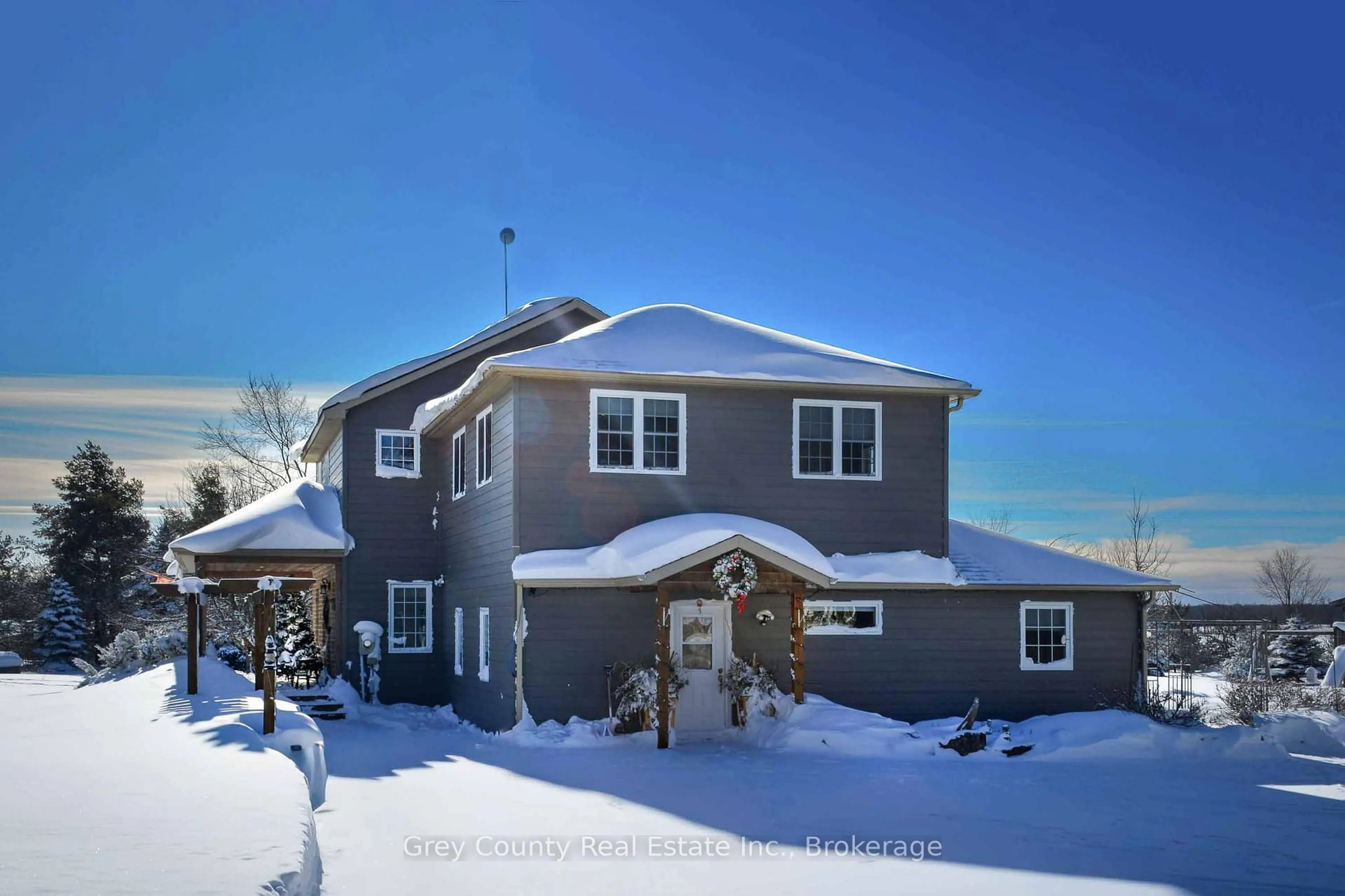 A pic from outside/outdoor area/front of a property/back of a property/a pic from drone, unknown for 135260 9th Line, Grey Highlands Ontario N0C 1H0