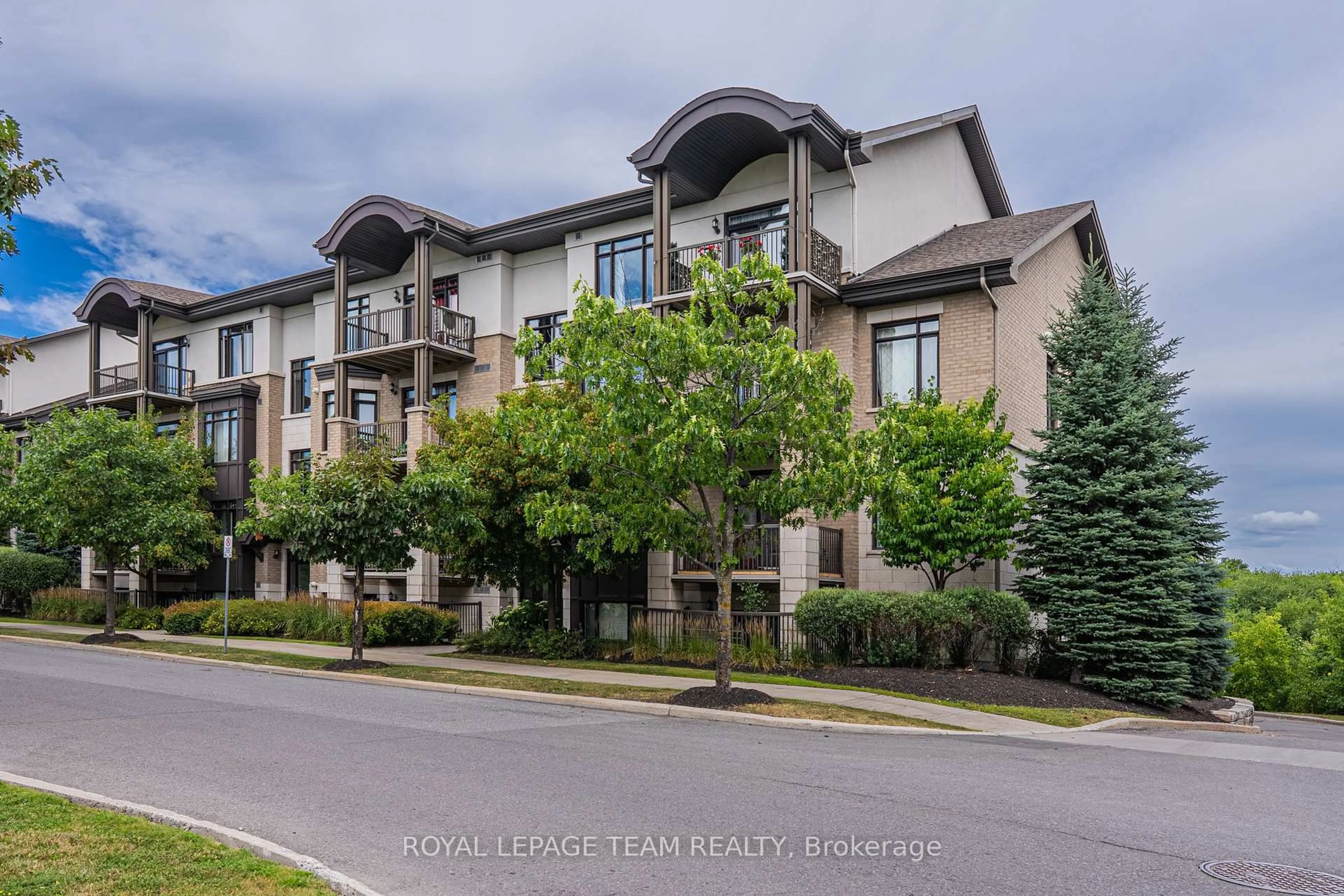 A pic from outside/outdoor area/front of a property/back of a property/a pic from drone, street for 805 Beauparc Private #304, Ottawa Ontario K1J 0B5