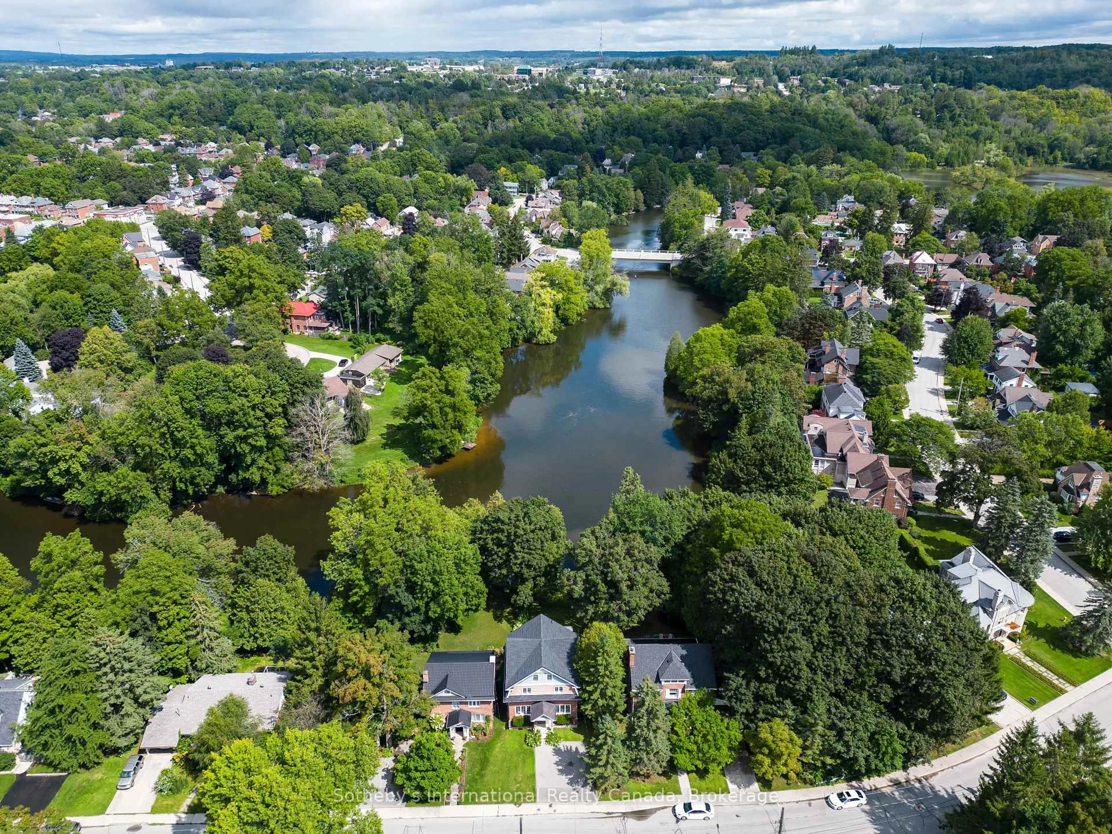 A pic from outside/outdoor area/front of a property/back of a property/a pic from drone, water/lake/river/ocean view for 457 2nd Ave, Owen Sound Ontario N4K 4L9