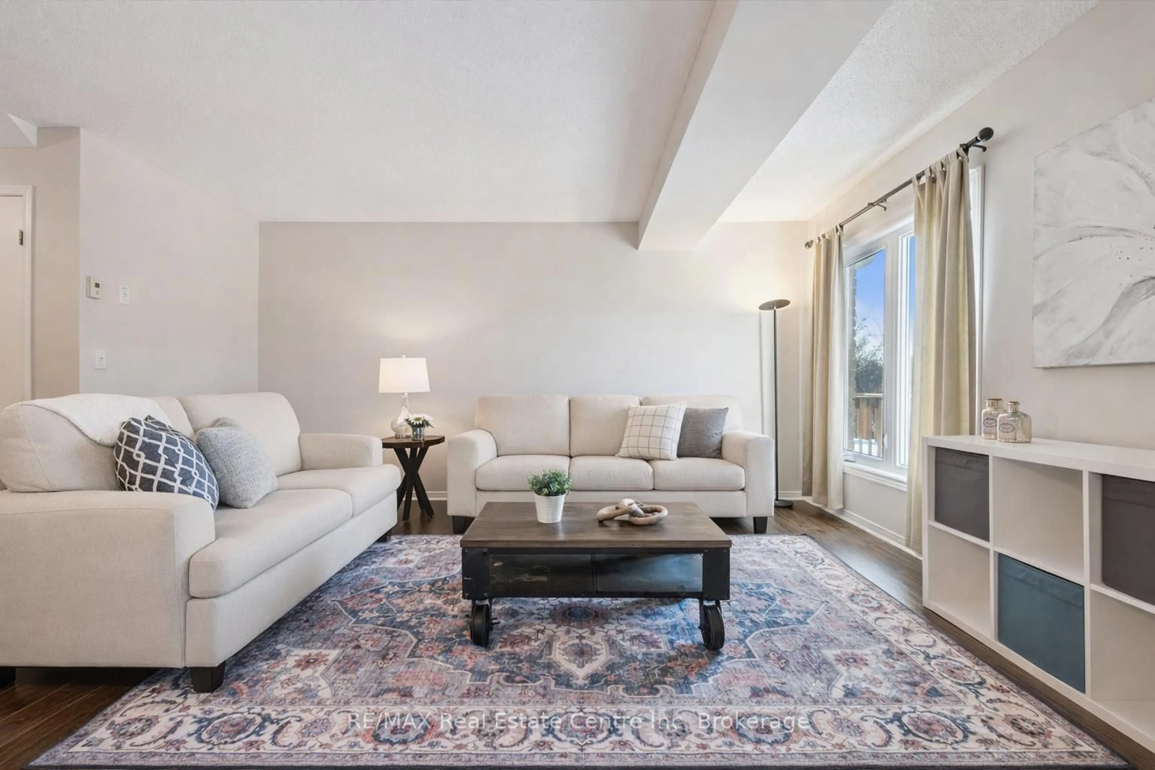 Living room with furniture, carpet floor for 12 EUGENE Dr, Guelph Ontario N1L 1P6