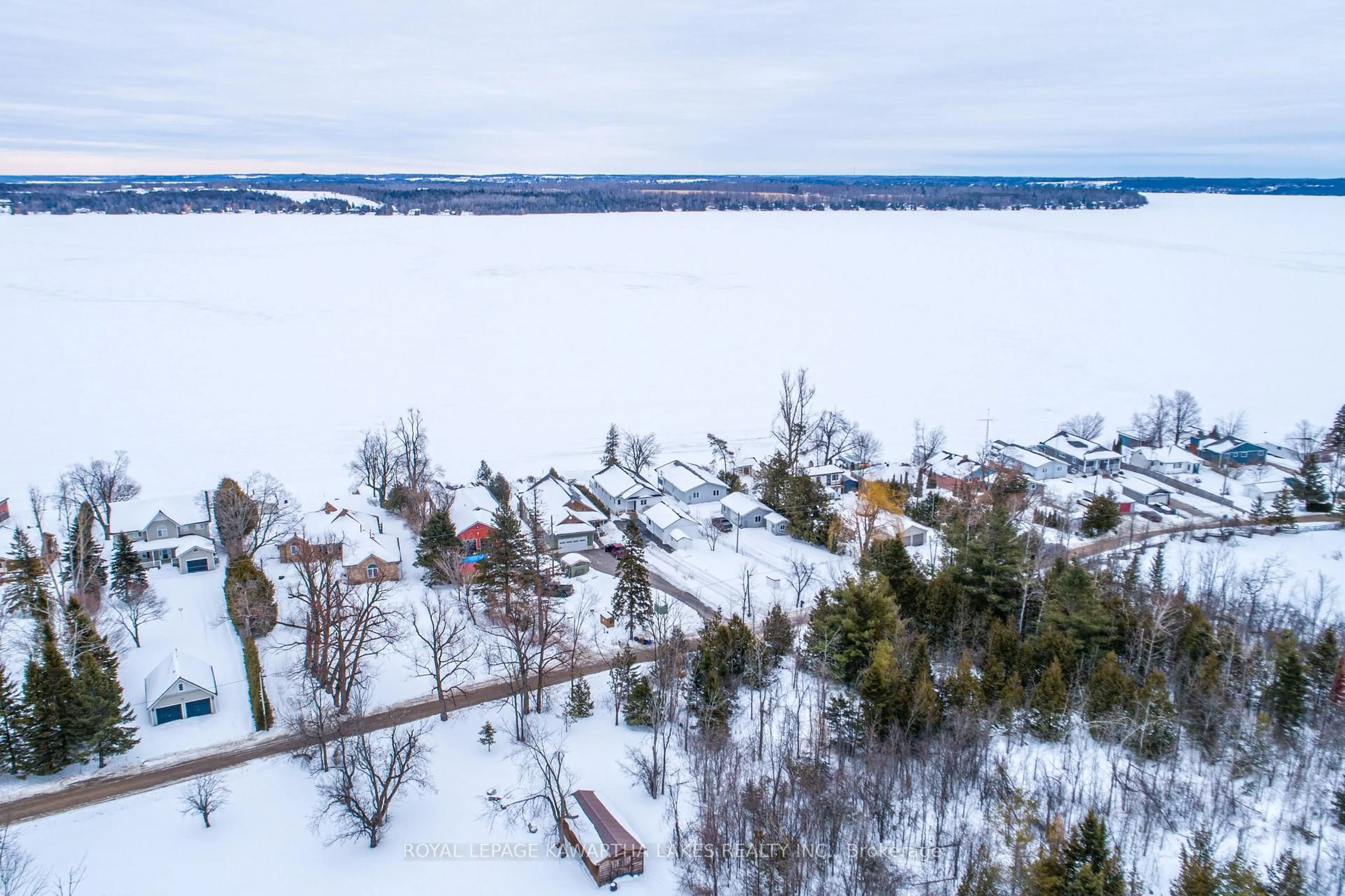 A pic from outside/outdoor area/front of a property/back of a property/a pic from drone, water/lake/river/ocean view for 57 Admiral Dr, Kawartha Lakes Ontario K0M 1G0