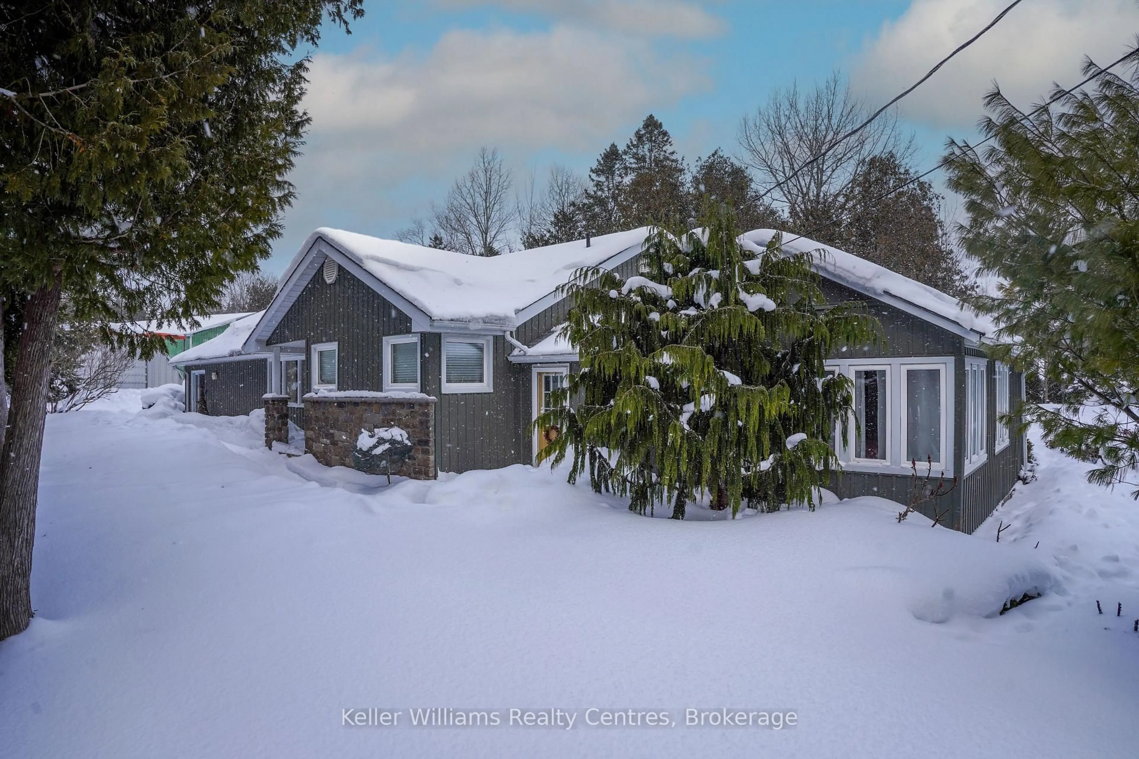 A pic from outside/outdoor area/front of a property/back of a property/a pic from drone, street for 158 Stokes Bay Rd, Northern Bruce Peninsula Ontario N0H 1W0
