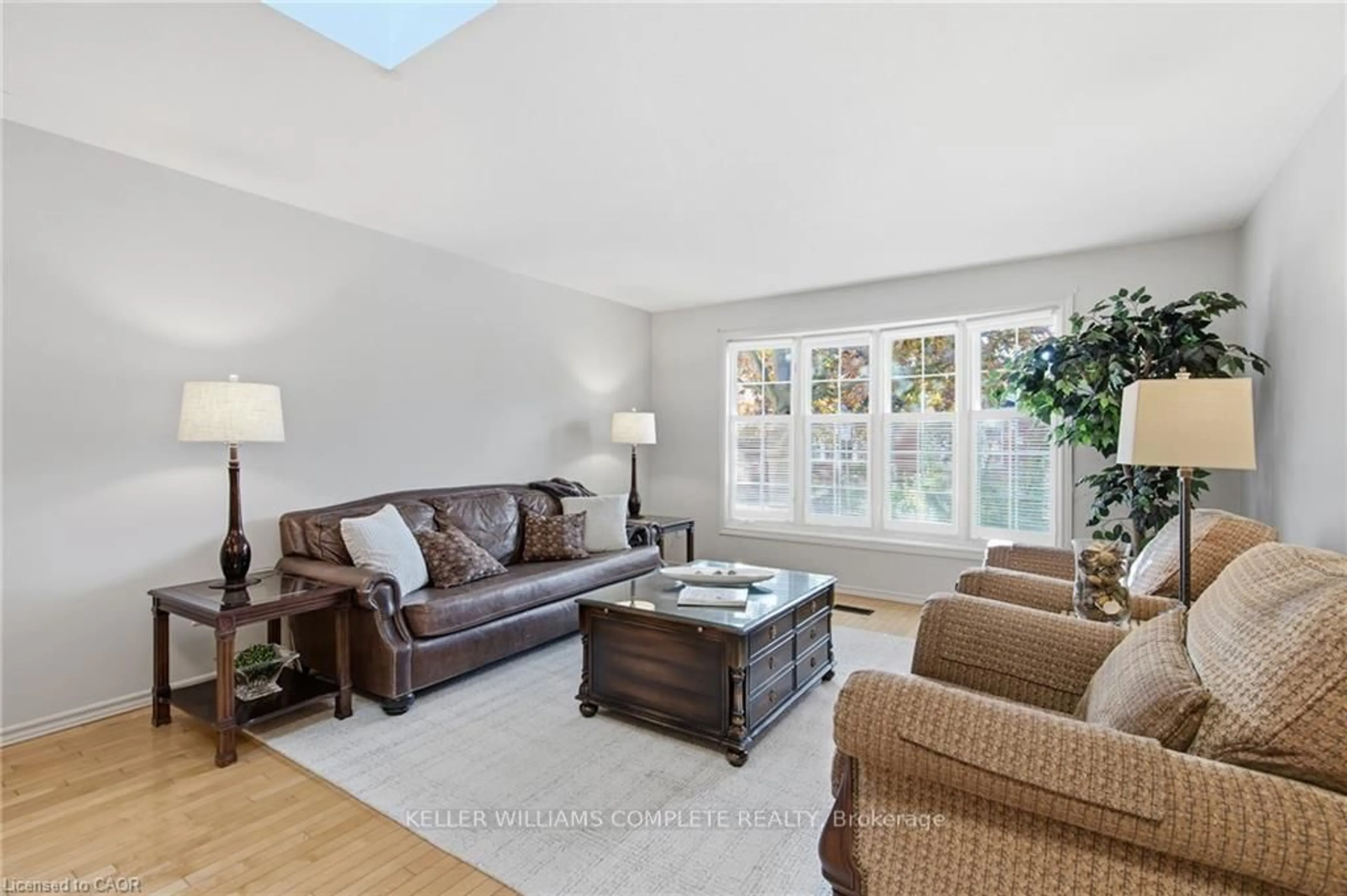 Living room with furniture, unknown for 229 Lynden Rd #25, Brantford Ontario N3R 8A7