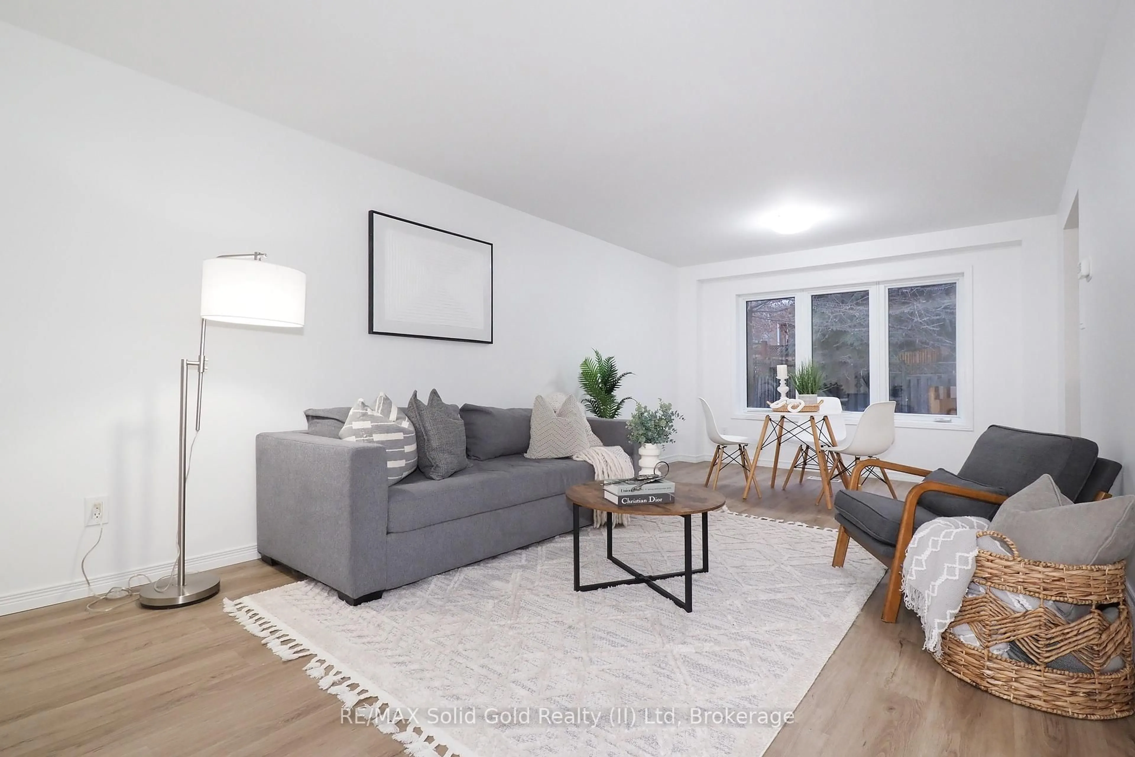 Living room with furniture, wood/laminate floor for 433 Exmoor St, Waterloo Ontario N2K 3X5