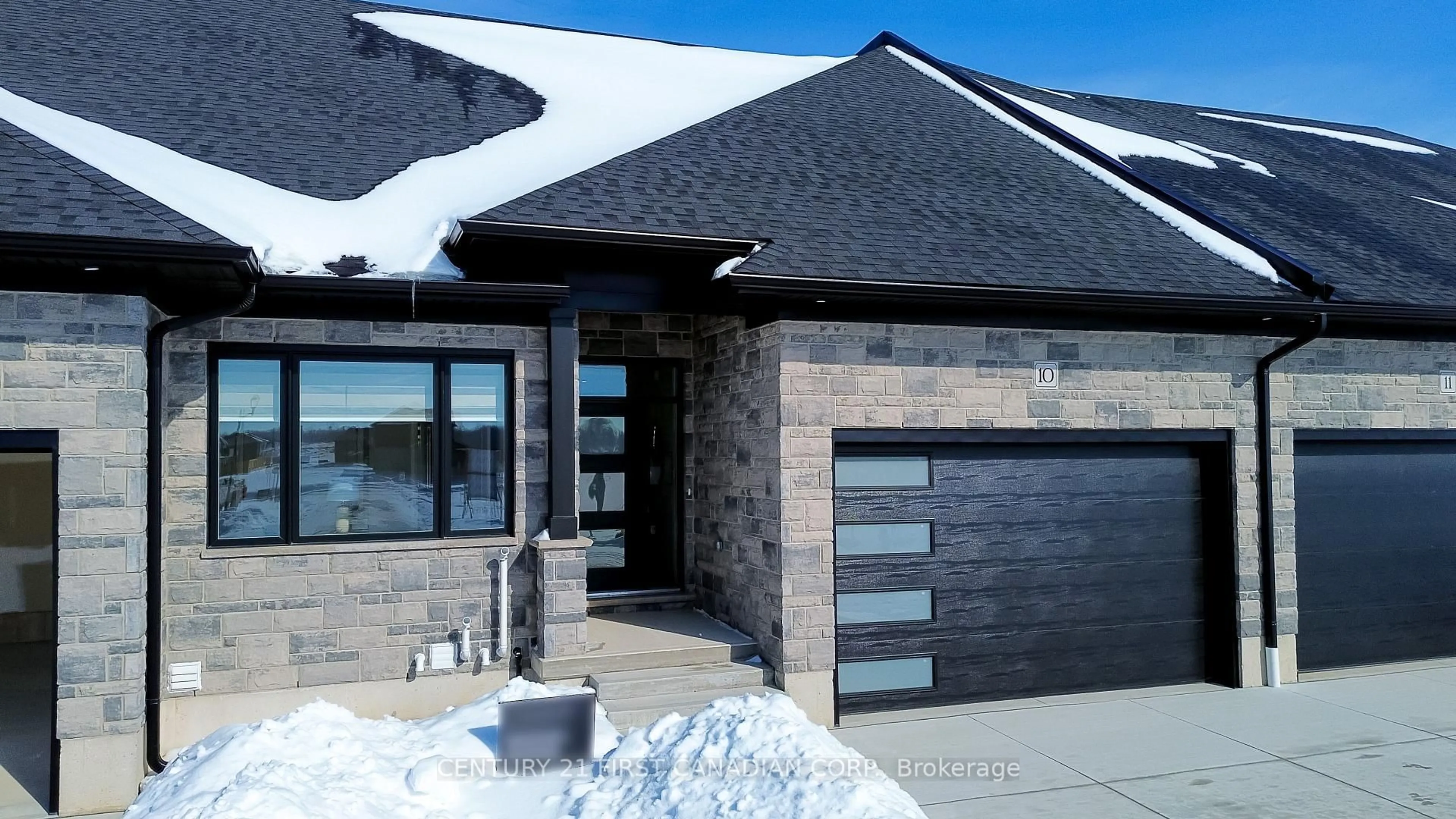 Home with brick exterior material, street for 32 Postma Cres #10, North Middlesex Ontario N0M 1A0