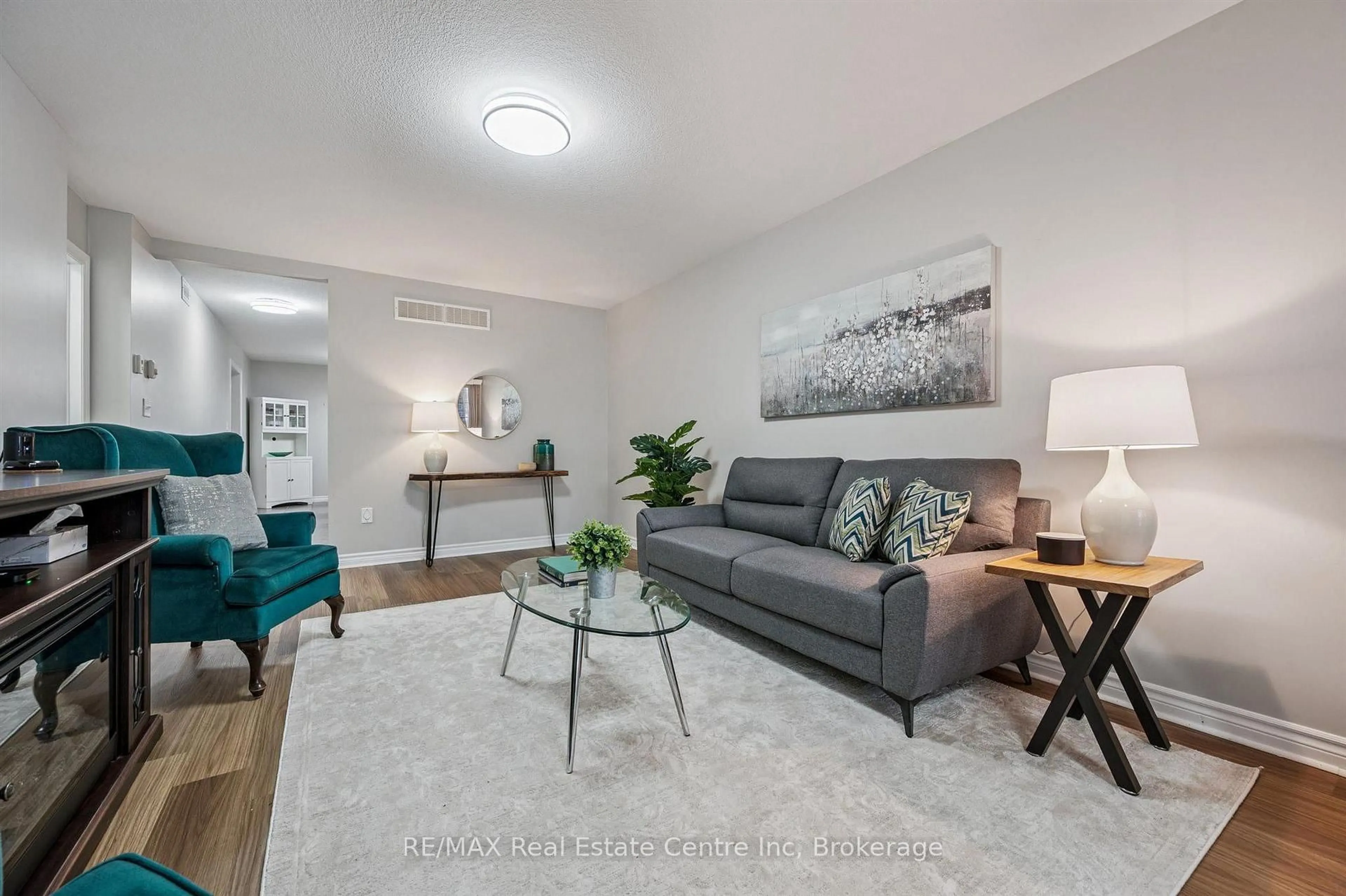 Living room with furniture, unknown for 21 Wideman Blvd, Guelph Ontario N1E 0J2