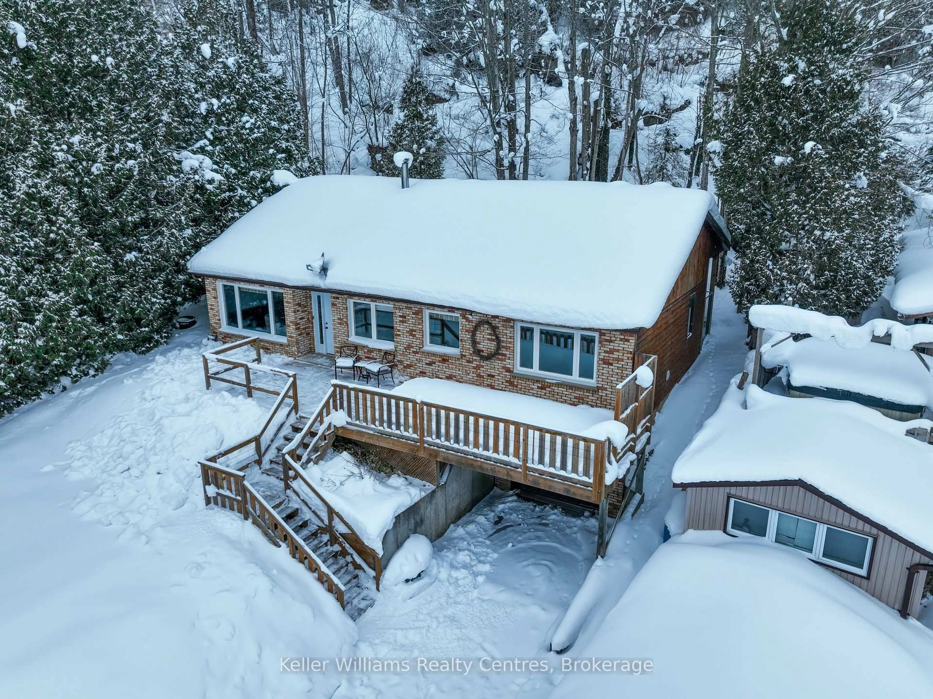 A pic from outside/outdoor area/front of a property/back of a property/a pic from drone, unknown for 121 Mallory Beach Rd, South Bruce Peninsula Ontario N0H 2T0
