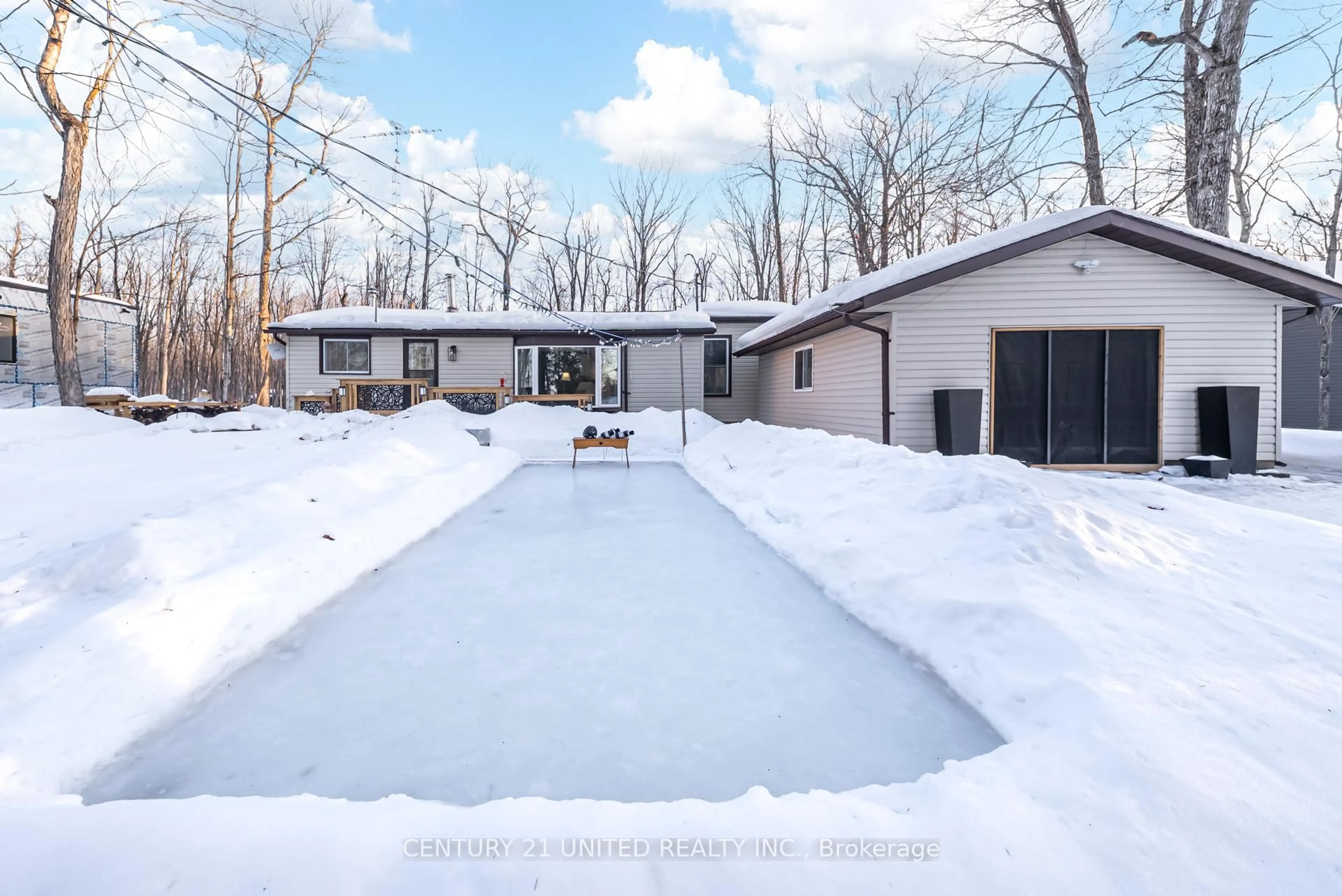 A pic from outside/outdoor area/front of a property/back of a property/a pic from drone, street for 32 Teds Lane, Trent Lakes Ontario K0L 1K0