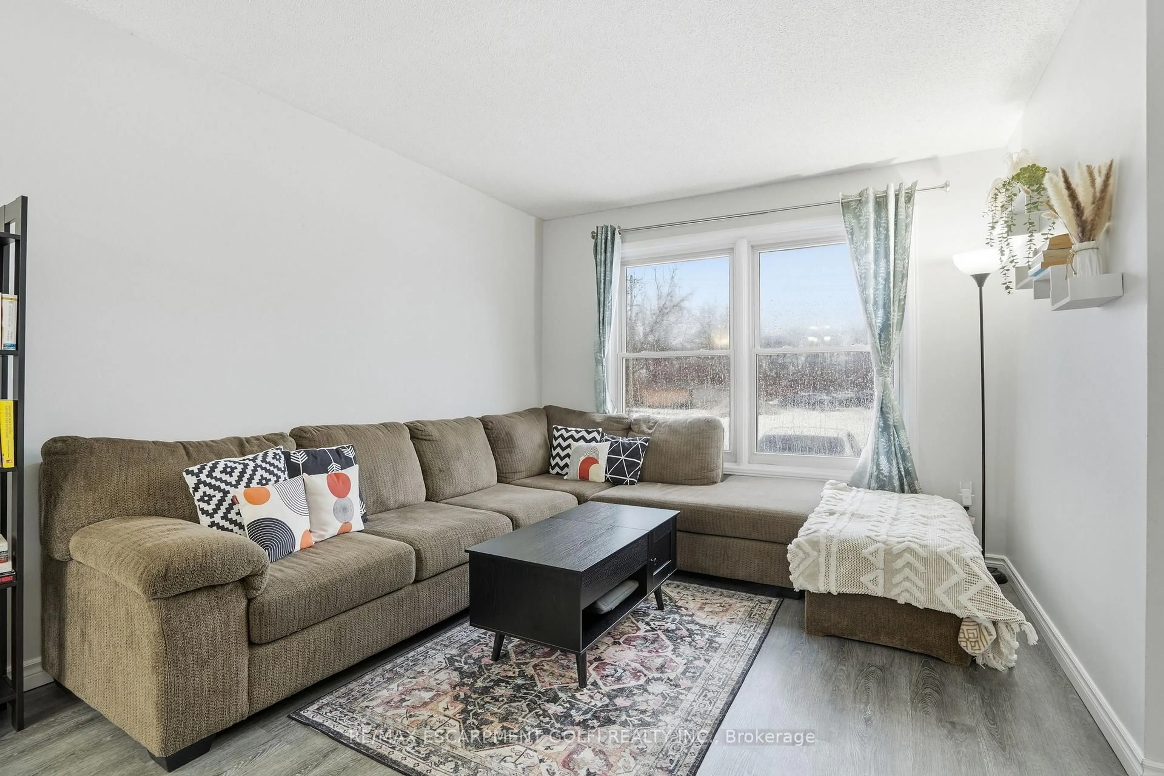 Living room with furniture, unknown for 596 Grey St #10, Brantford Ontario N3S 4Y1