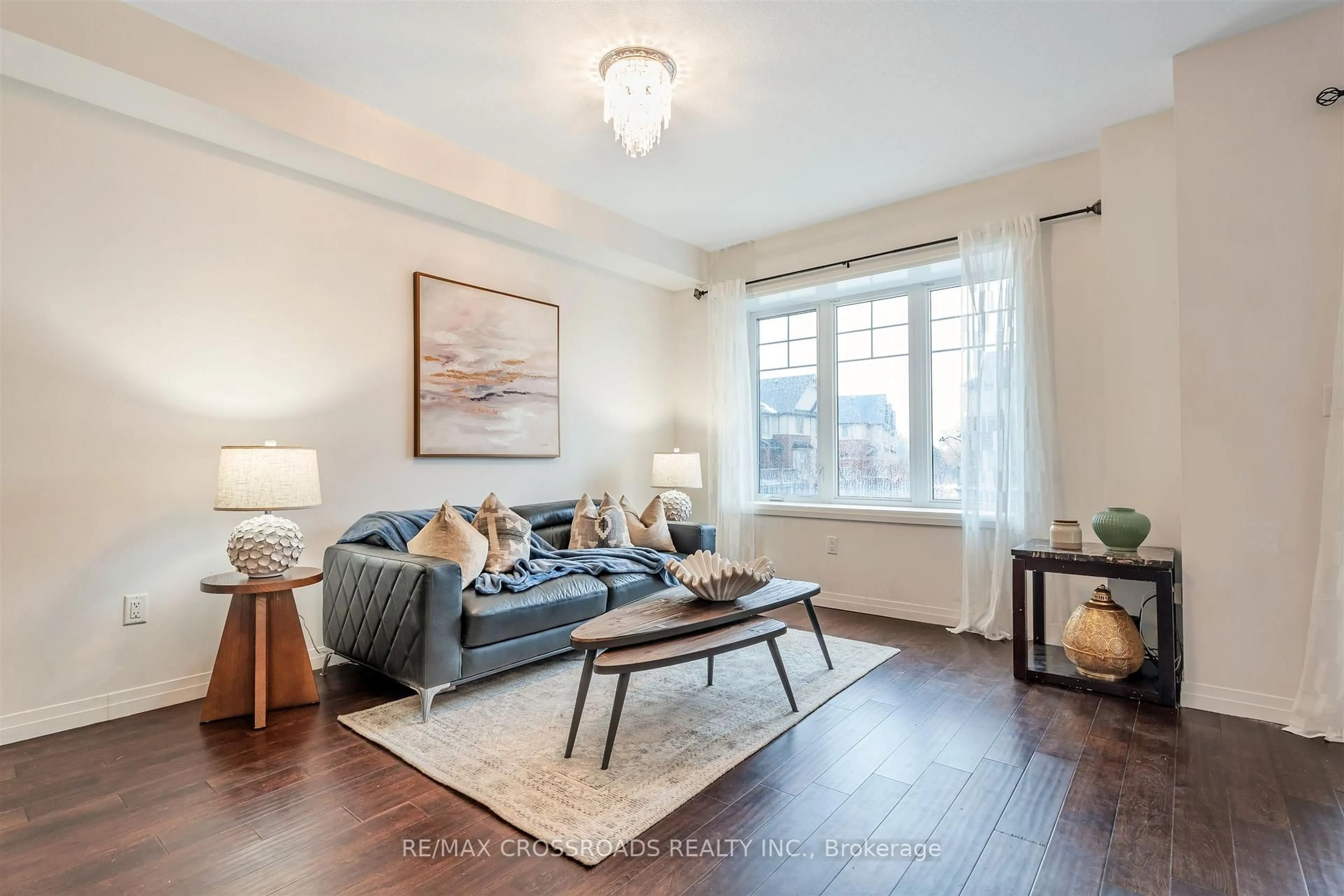 Living room with furniture, wood/laminate floor for 4 Near Lane, Hamilton Ontario L9G 0H2