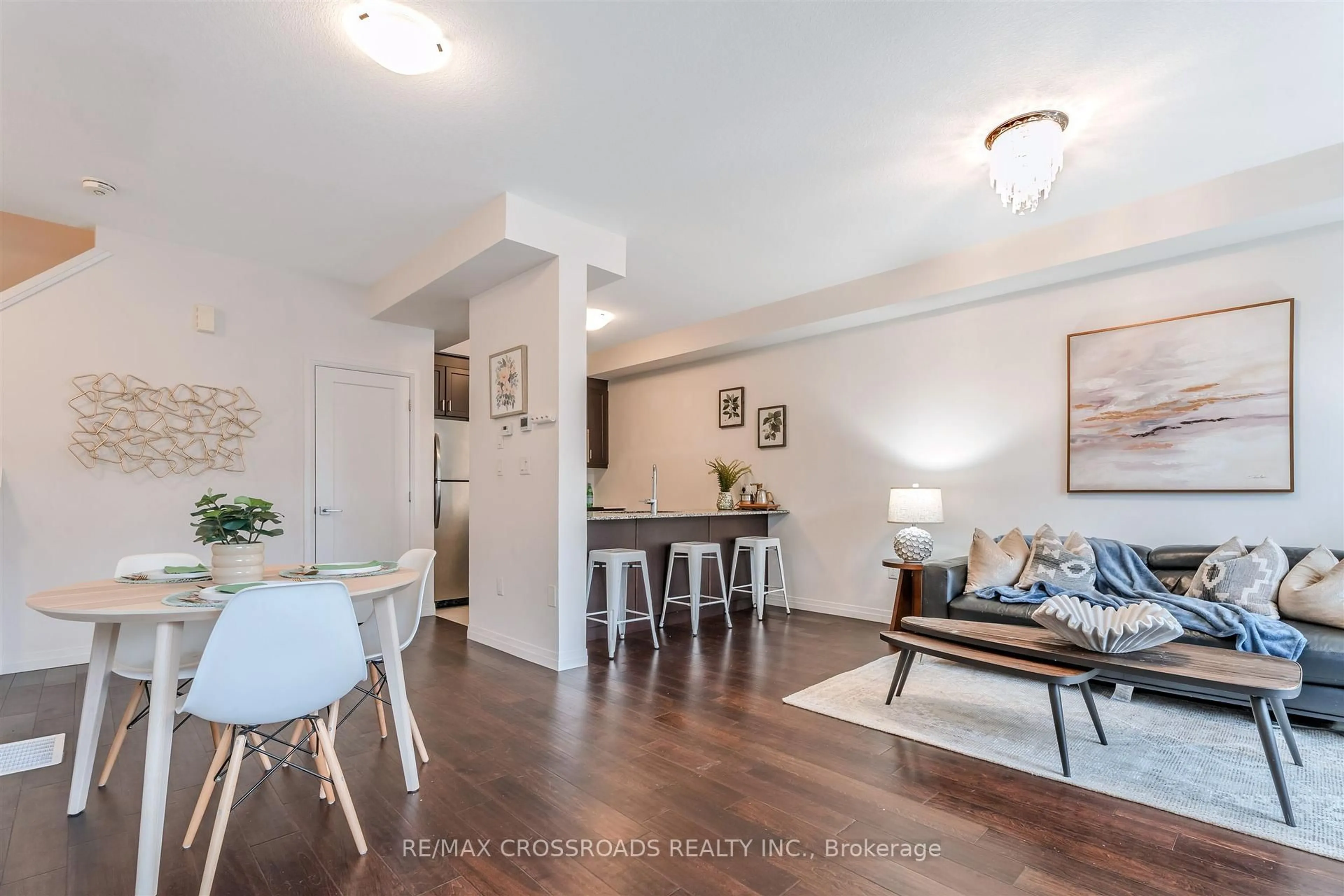 Living room with furniture, wood/laminate floor for 4 Near Lane, Hamilton Ontario L9G 0H2