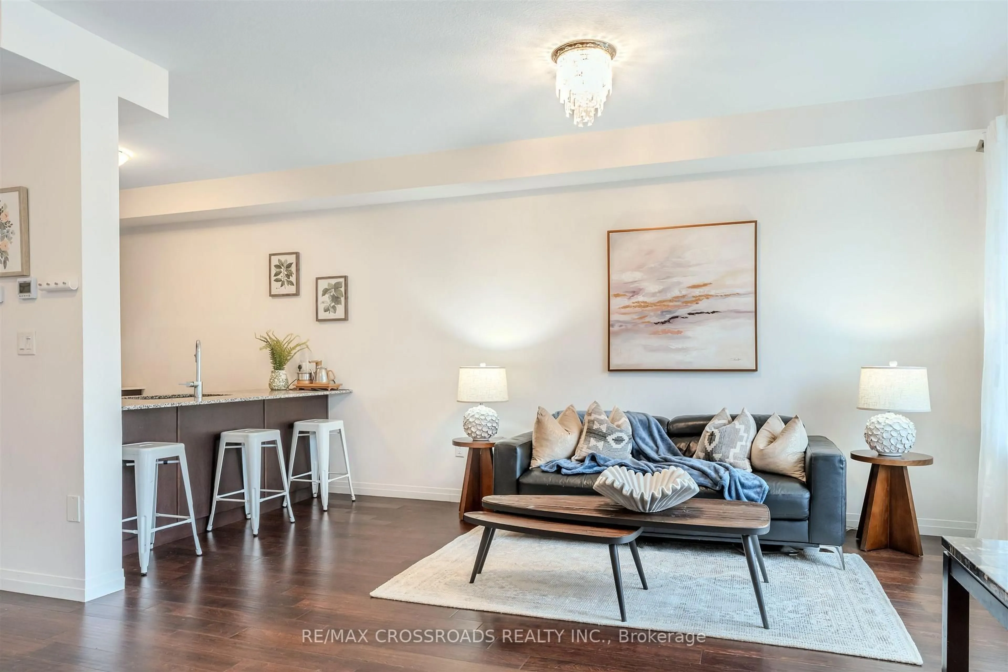 Living room with furniture, wood/laminate floor for 4 Near Lane, Hamilton Ontario L9G 0H2