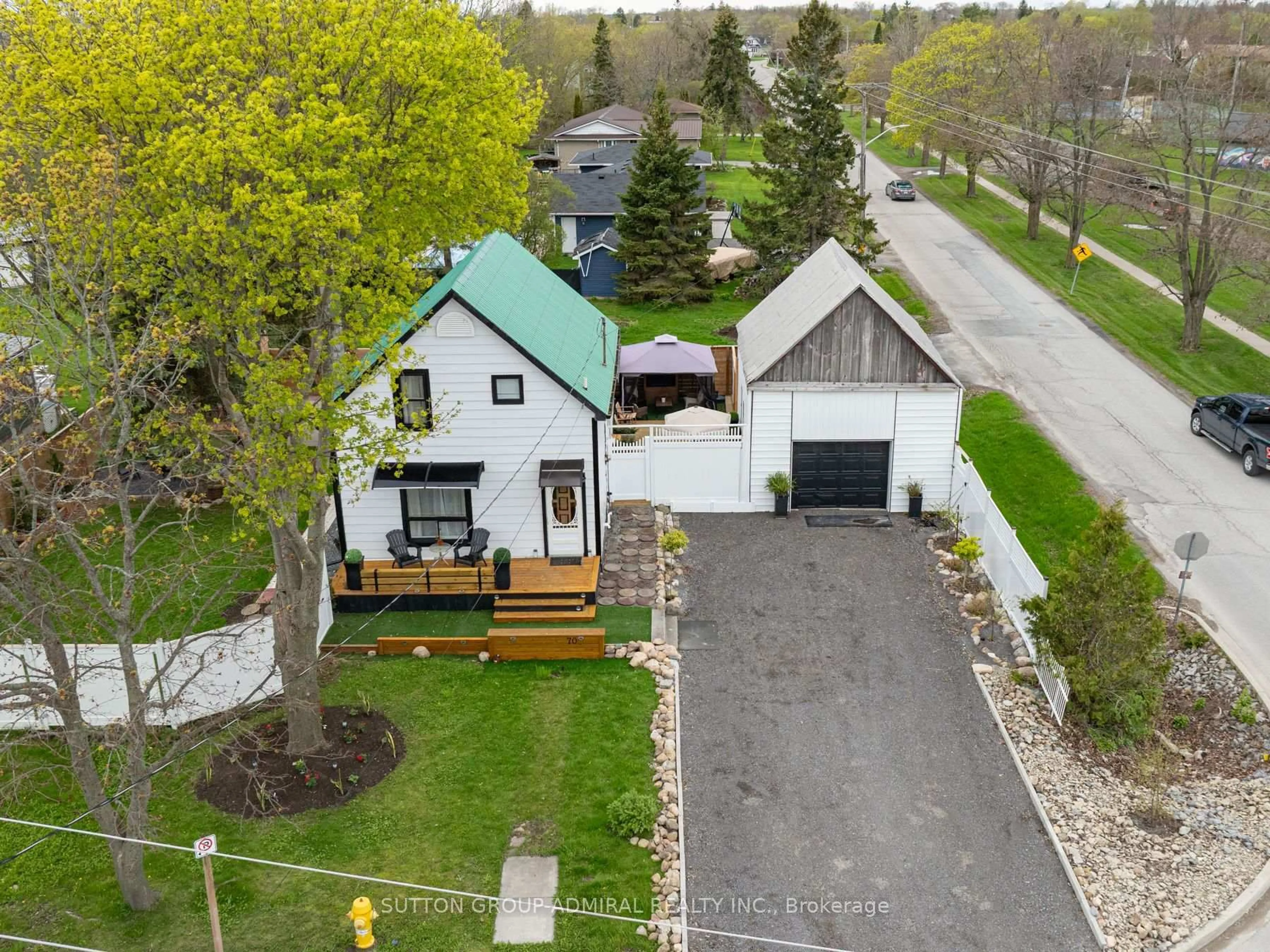 A pic from outside/outdoor area/front of a property/back of a property/a pic from drone, street for 70 Belleville St, Prince Edward County Ontario K0K 3L0