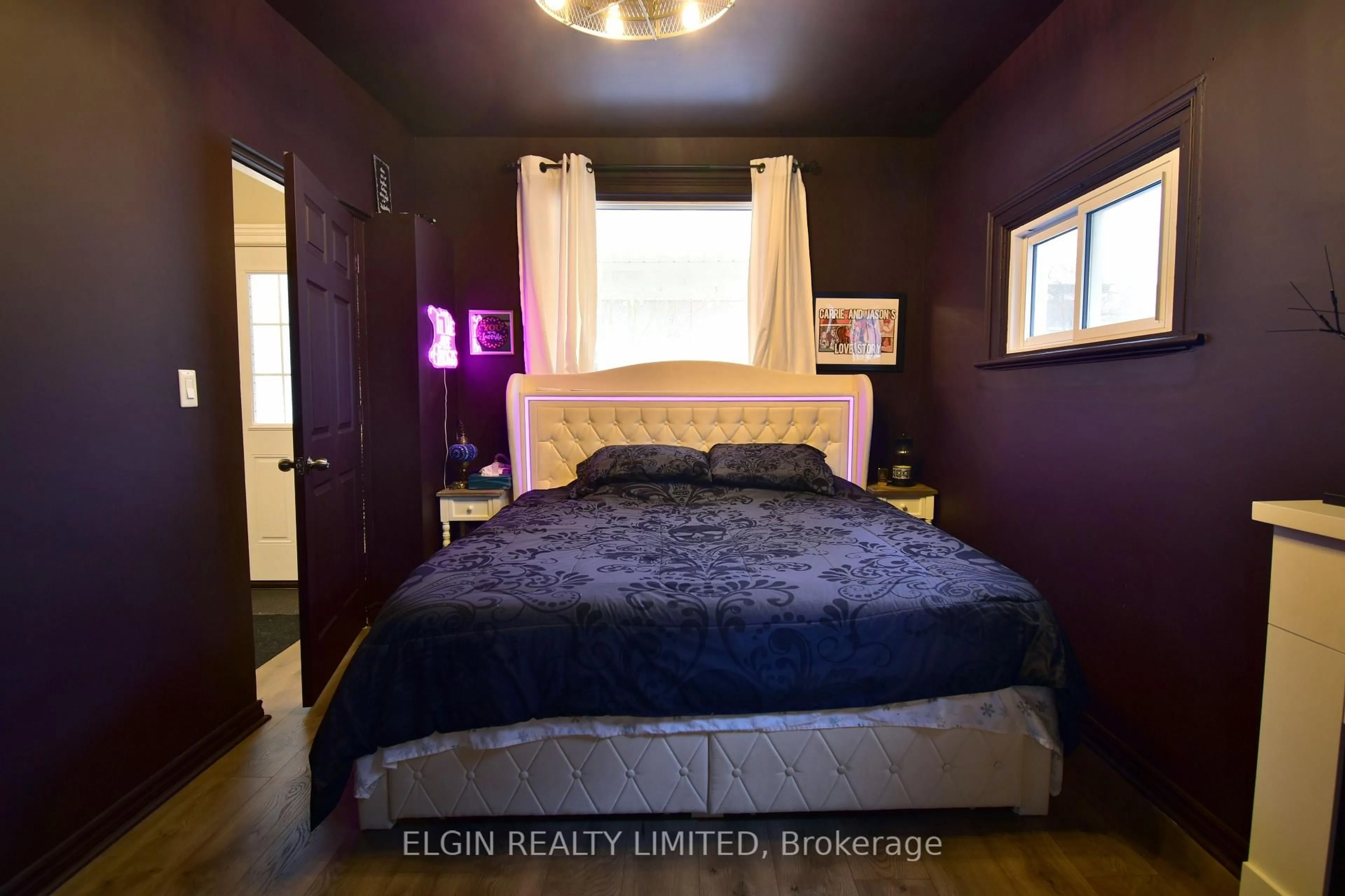 Bedroom with bed, wood/laminate floor for 57 Scott St, St. Thomas Ontario N5P 1K7