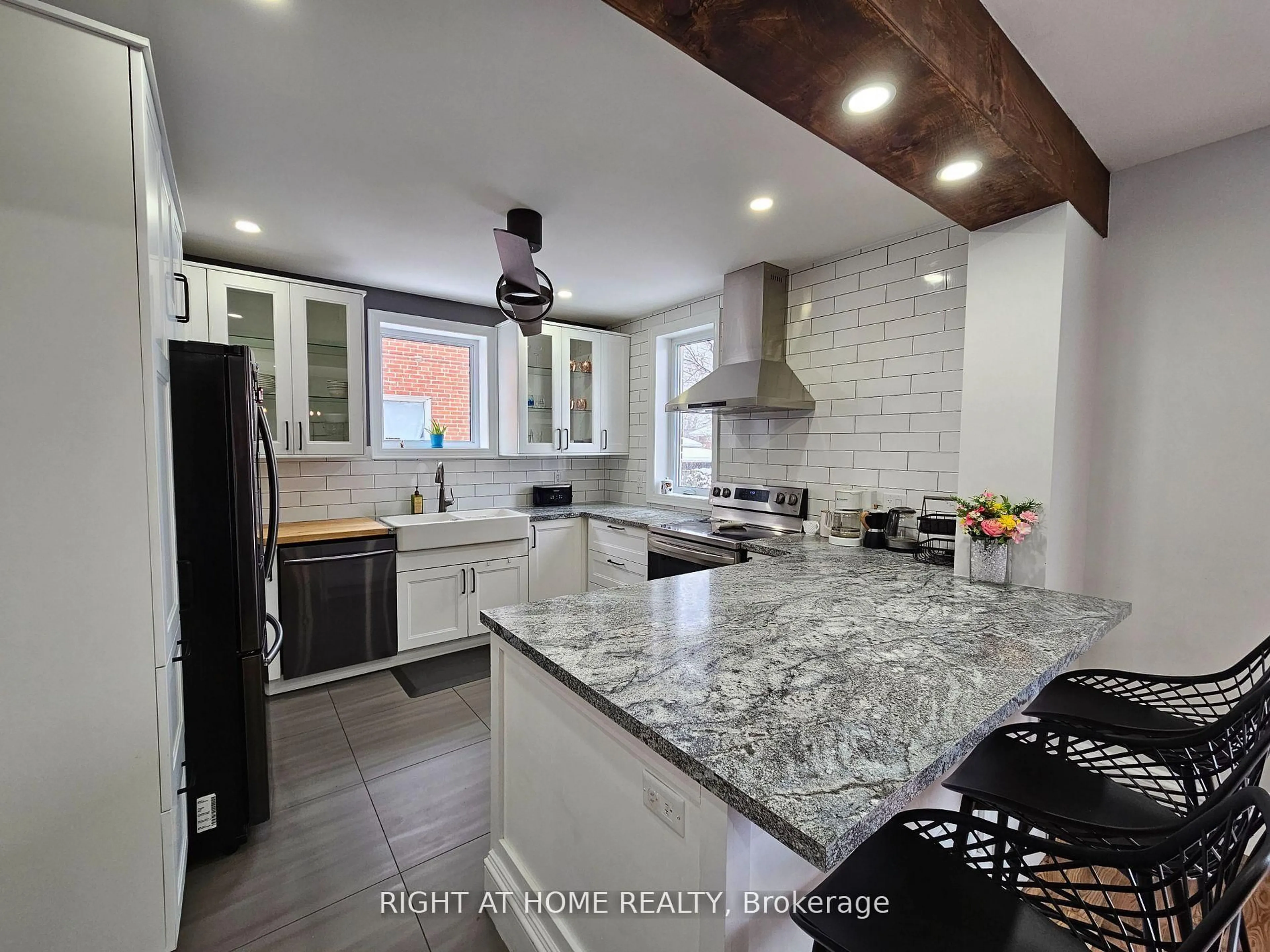 Open concept kitchen, ceramic/tile floor for 214 Kenilworth Ave, Hamilton Ontario L8K 2T4