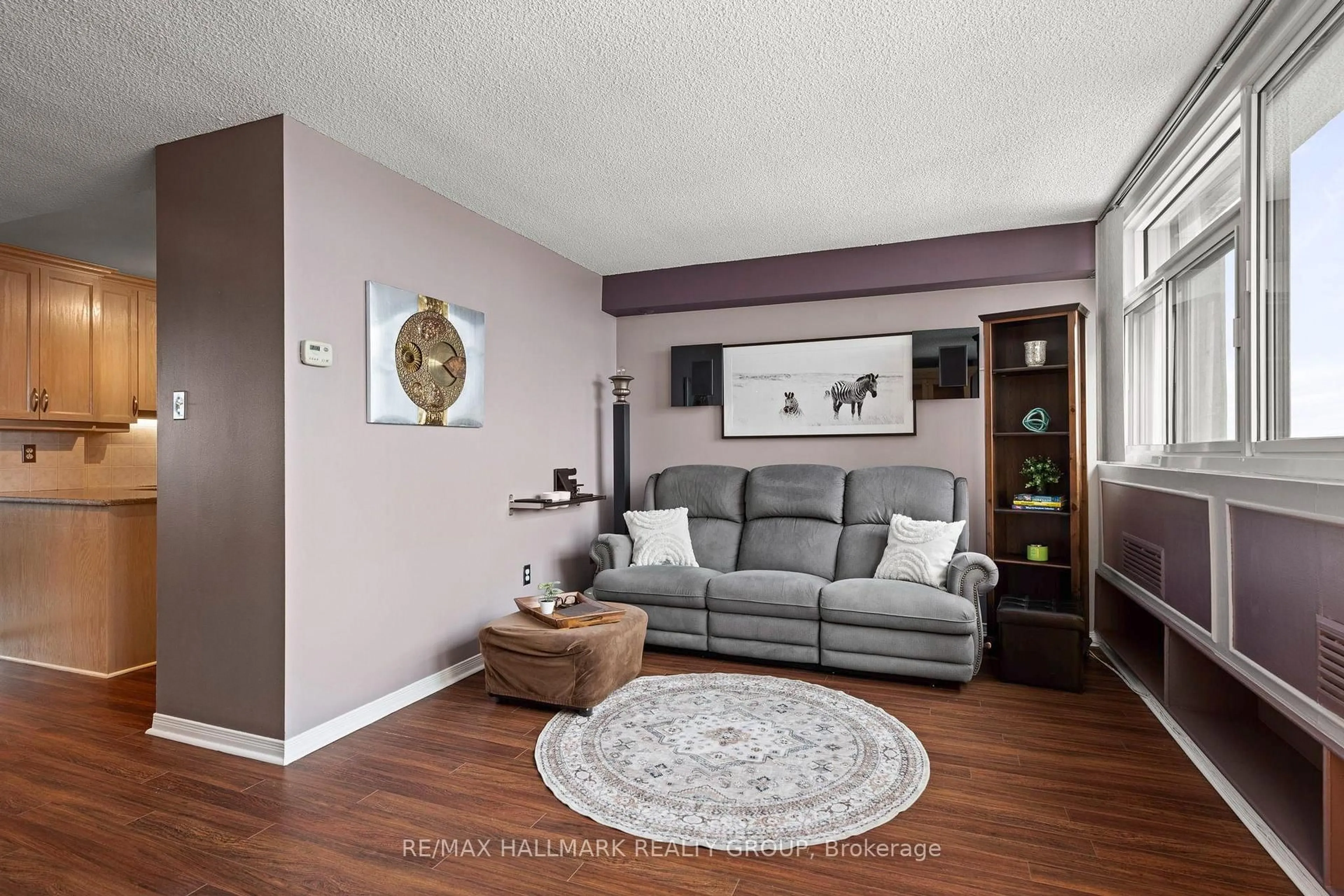Living room with furniture, wood/laminate floor for 500 Laurier Ave #2301, Ottawa Ontario K1R 5E1