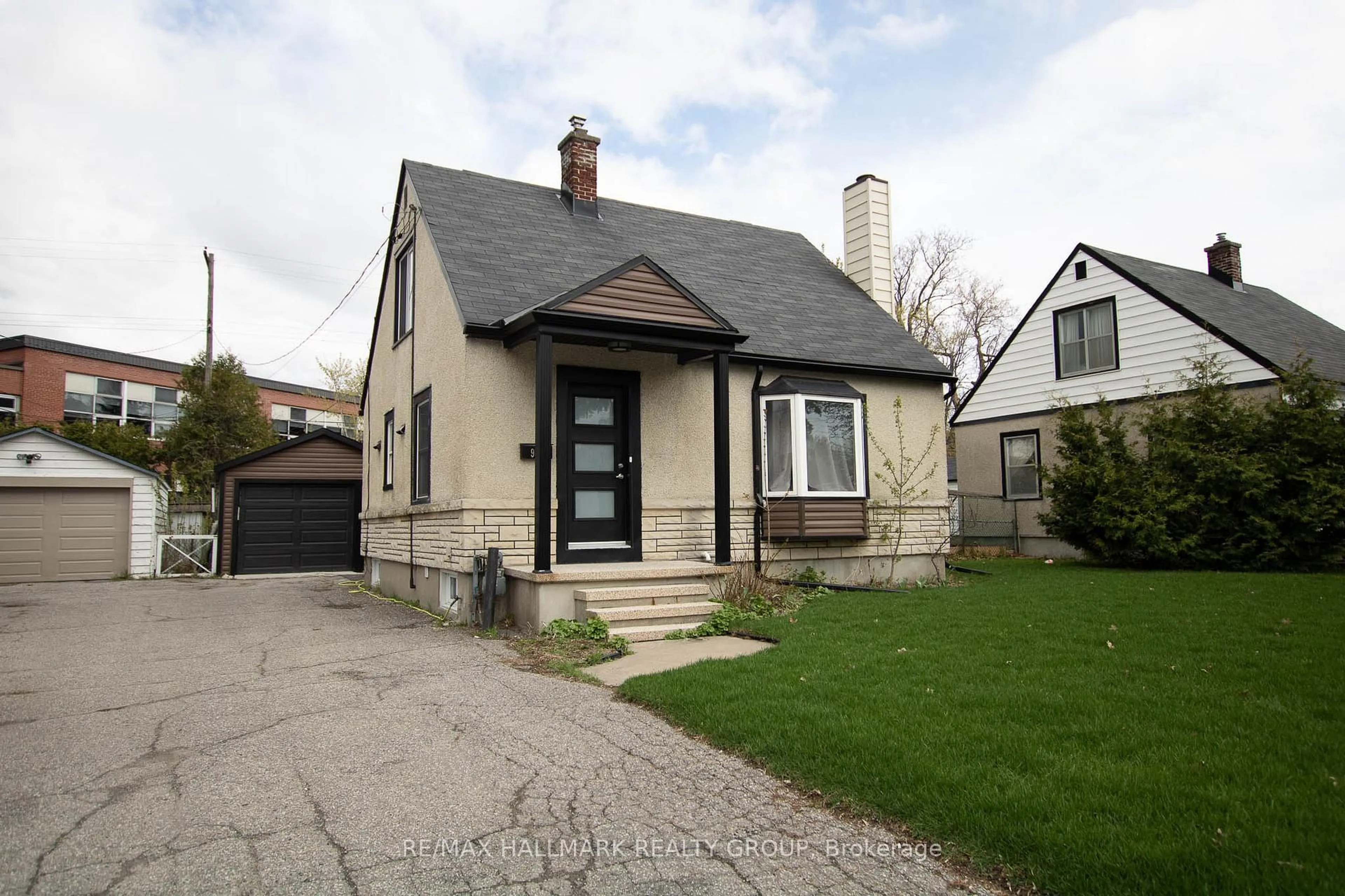 Home with brick exterior material, street for 929 Merivale Rd, Ottawa Ontario K1Z 5Z7