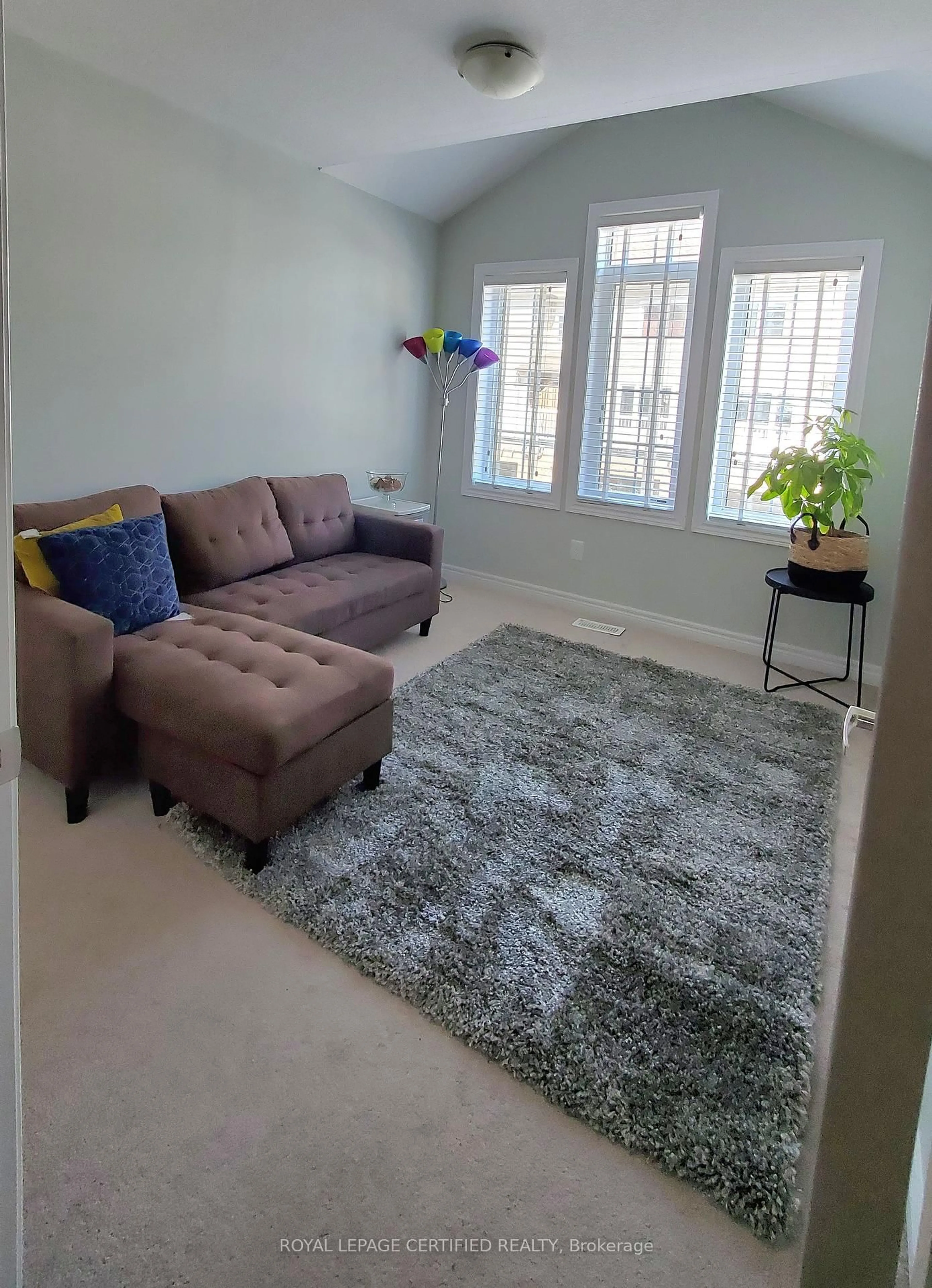 Living room with furniture, carpet floor for 570 Linden Dr ##27, Cambridge Ontario N3H 0C9