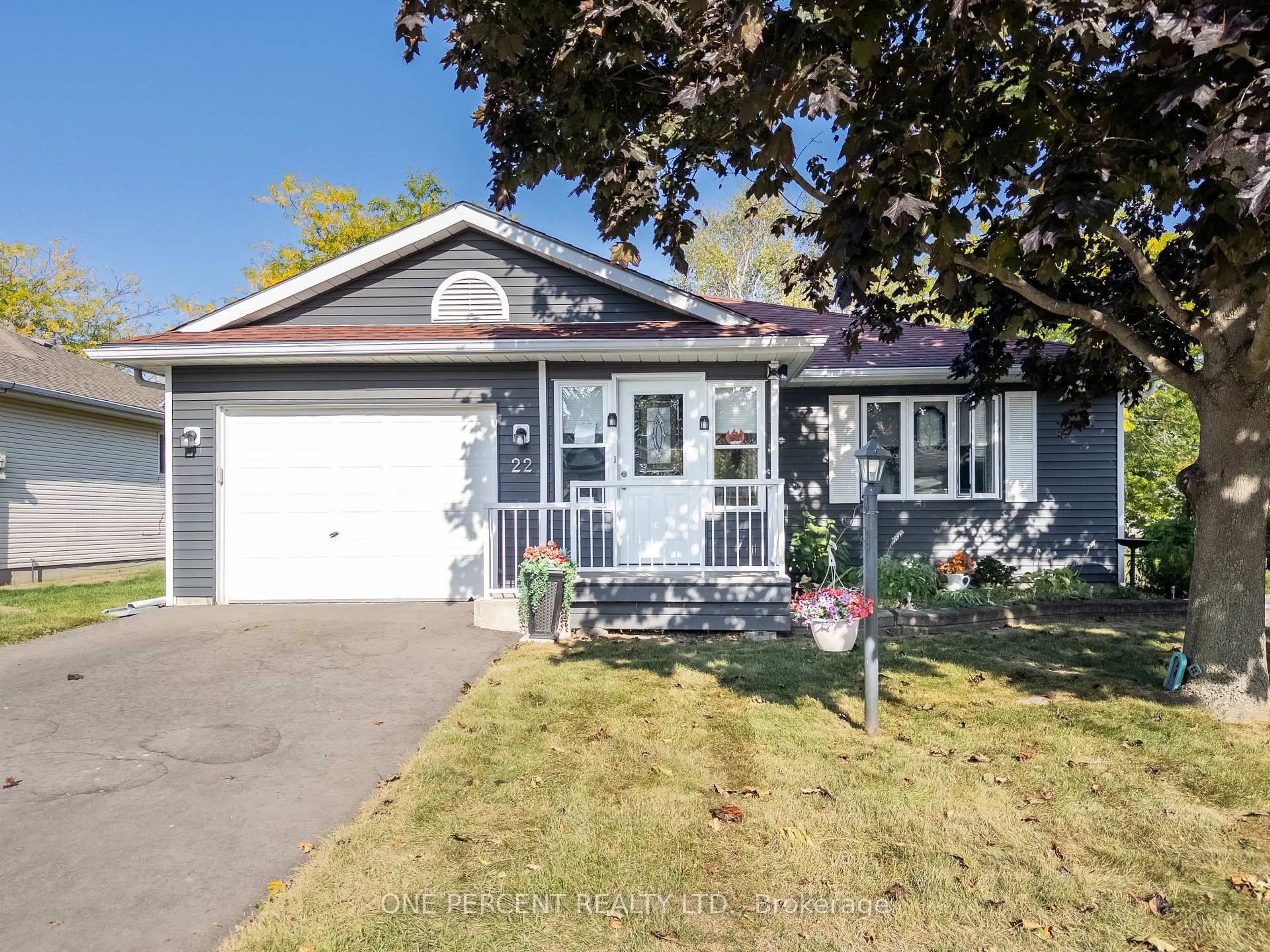 Home with vinyl exterior material, street for 22 HERITAGE Dr, Prince Edward County Ontario K0K 3L0