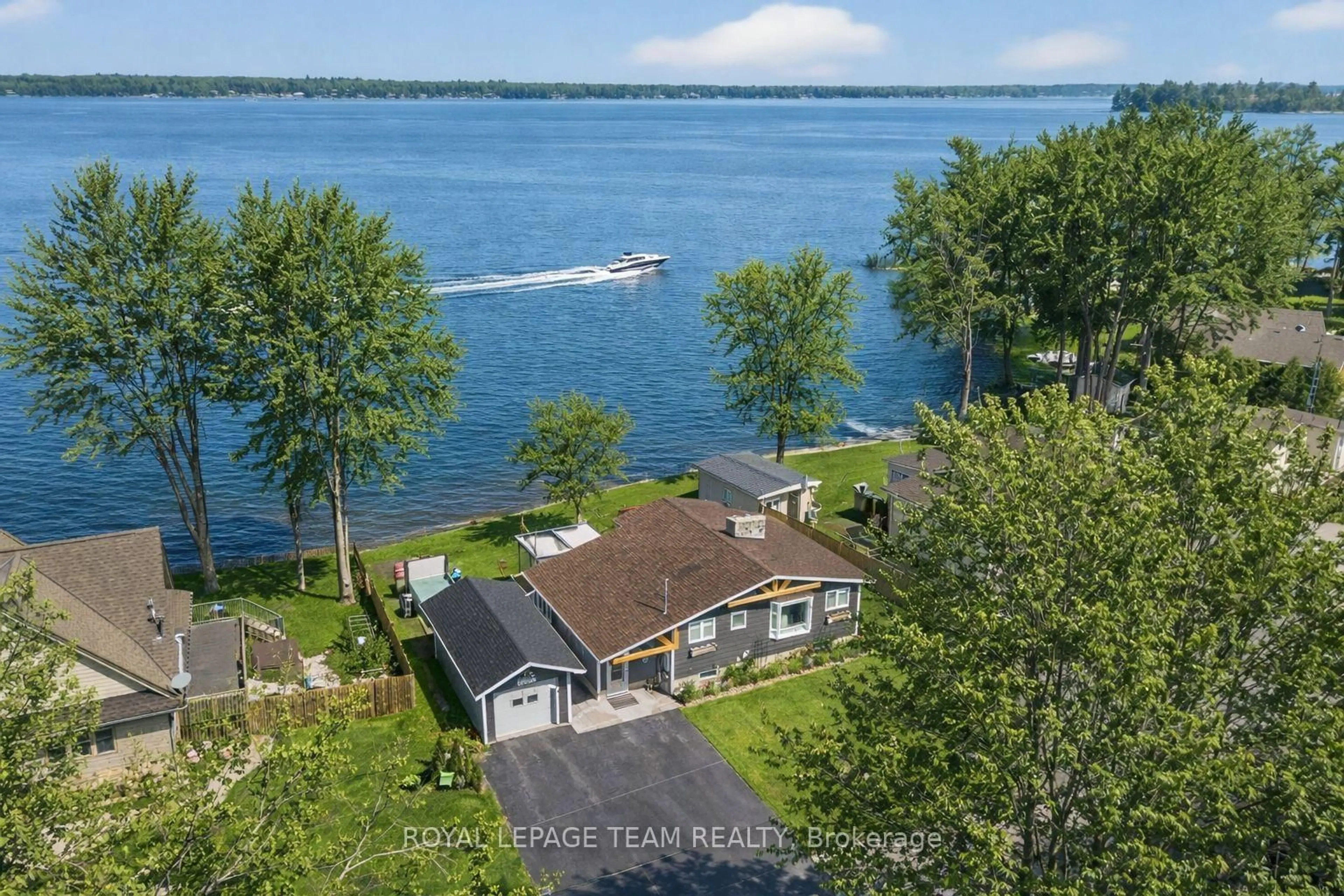 A pic from outside/outdoor area/front of a property/back of a property/a pic from drone, water/lake/river/ocean view for 128 Grasshopper Point Rd, Drummond/North Elmsley Ontario K7H 0J4
